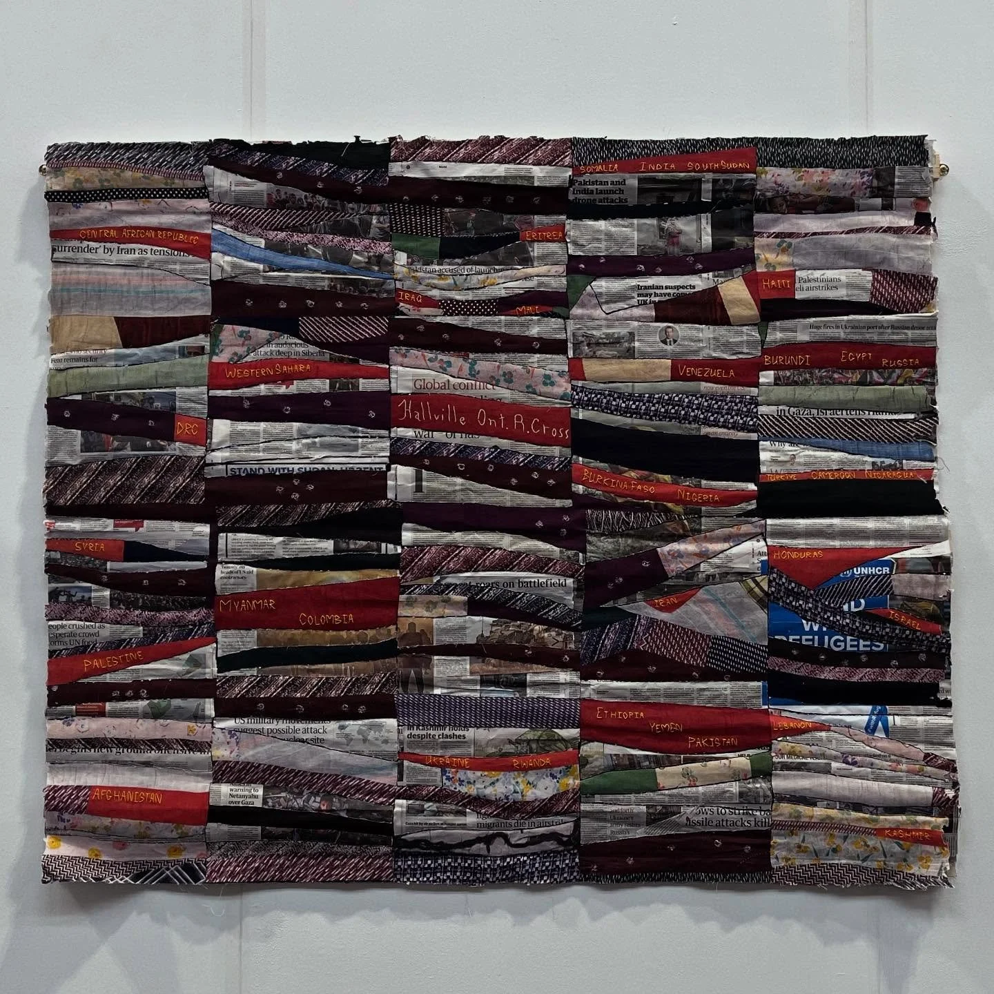 This quilt, Uprooted, was inspired by the Hallville Canadian Red Cross quilt in the Quilters&rsquo; Guild Collection. 
Arising from my studies at Bradford School of Art, it was made to raise awareness of the plight of refugees who are still being upr