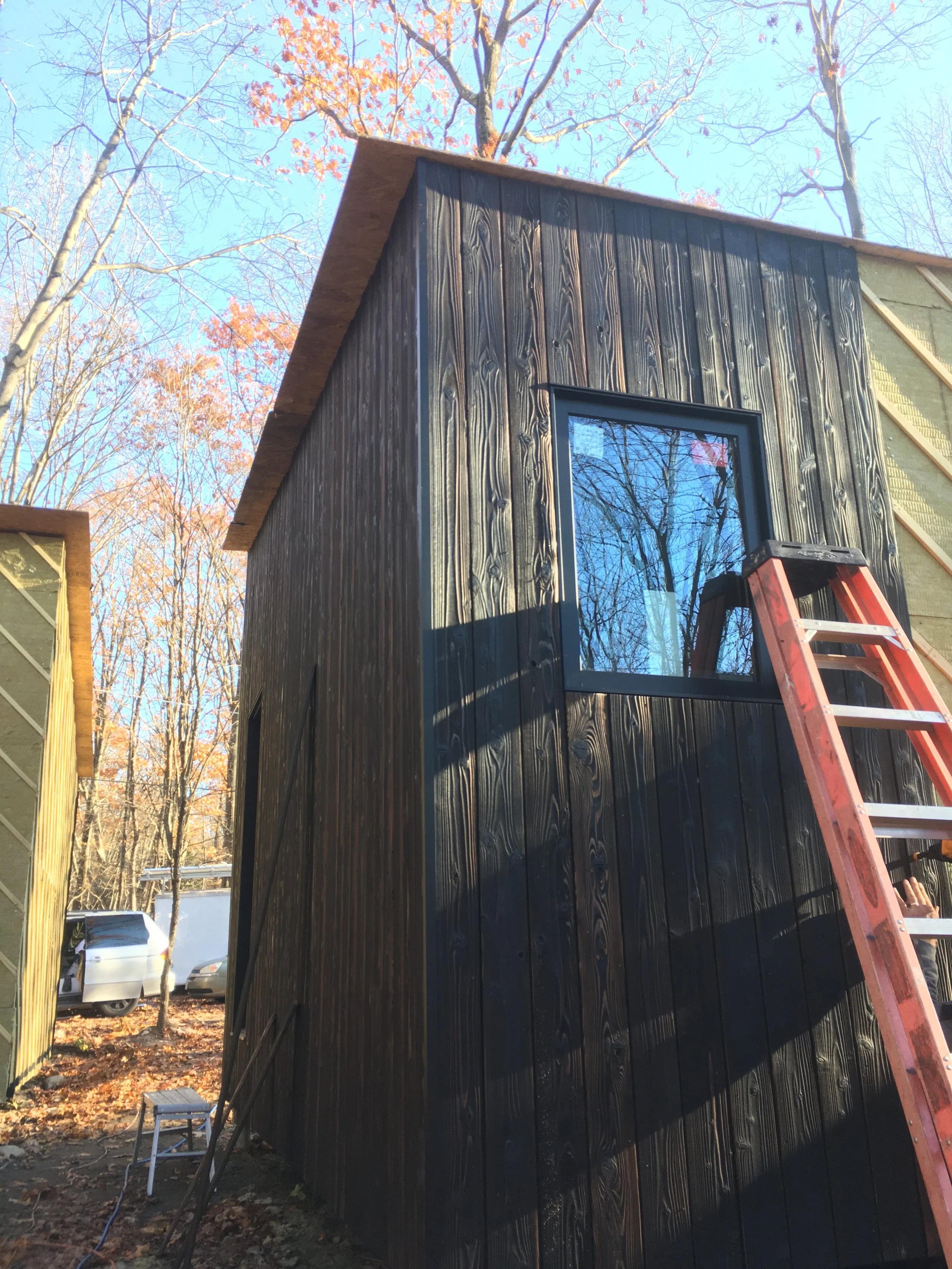   Pika-Pika siding from Nakamoto Forestry  is installed on a rainscreen system. 