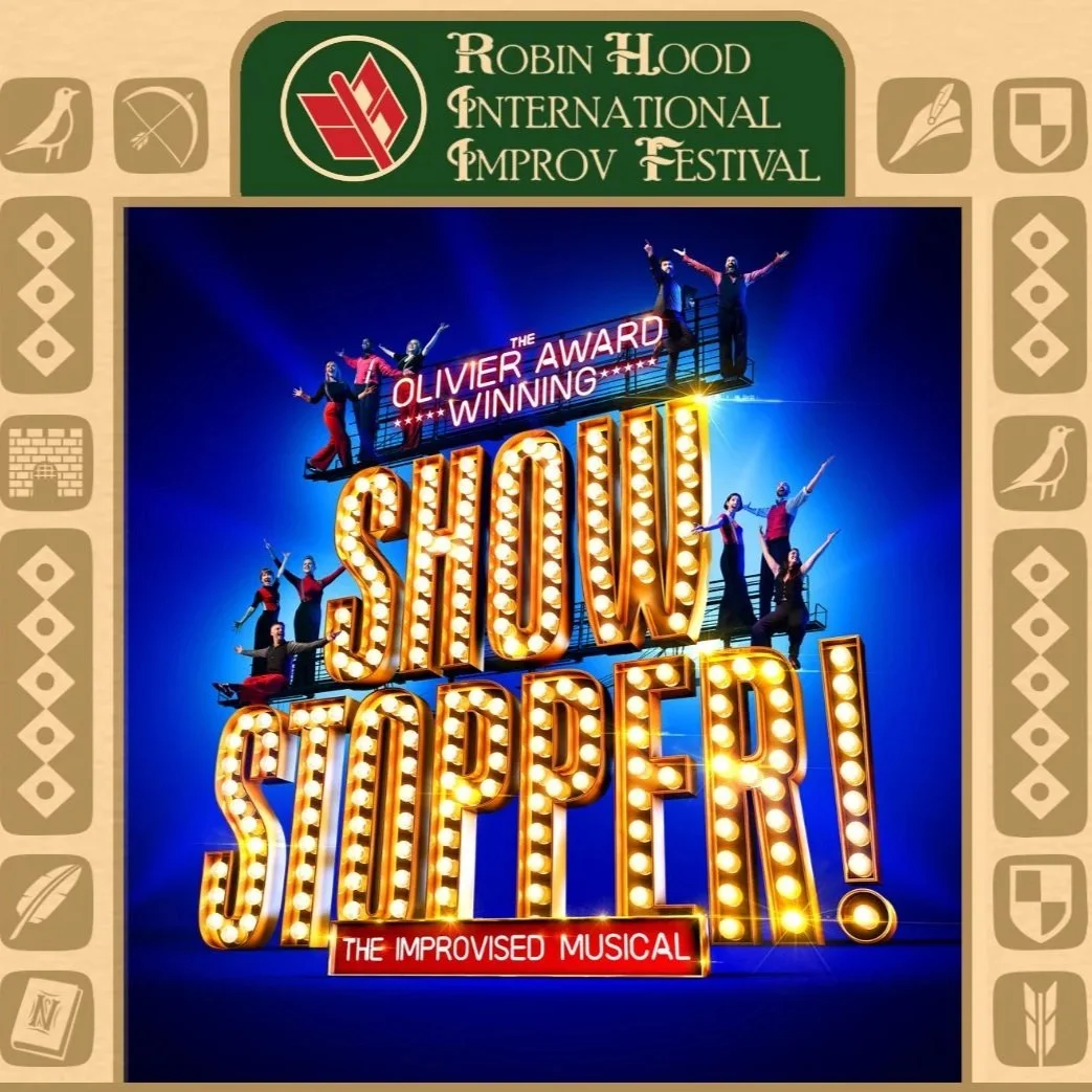 The words "show stopper" in lights with improvisers sganding on either side of the large sign.