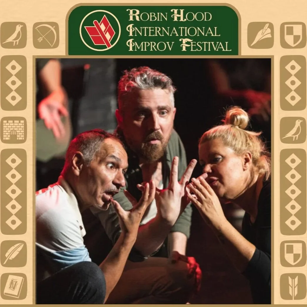Three improvisers in the picture. The ones on the left and right are facing inwards looking at their hands. The one in the centre is facing in the direction of the camera doing the same thing as the other two