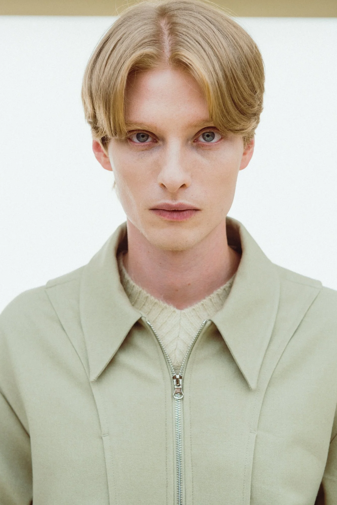 Portrait of a blonde male model in a studio in Seoul