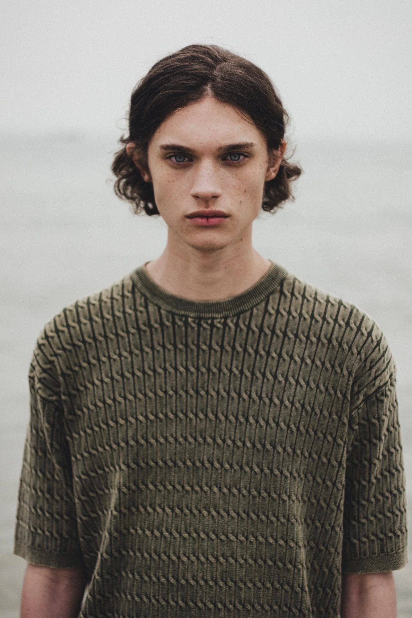 Portrait photograph of a male model at the beach in Seoul