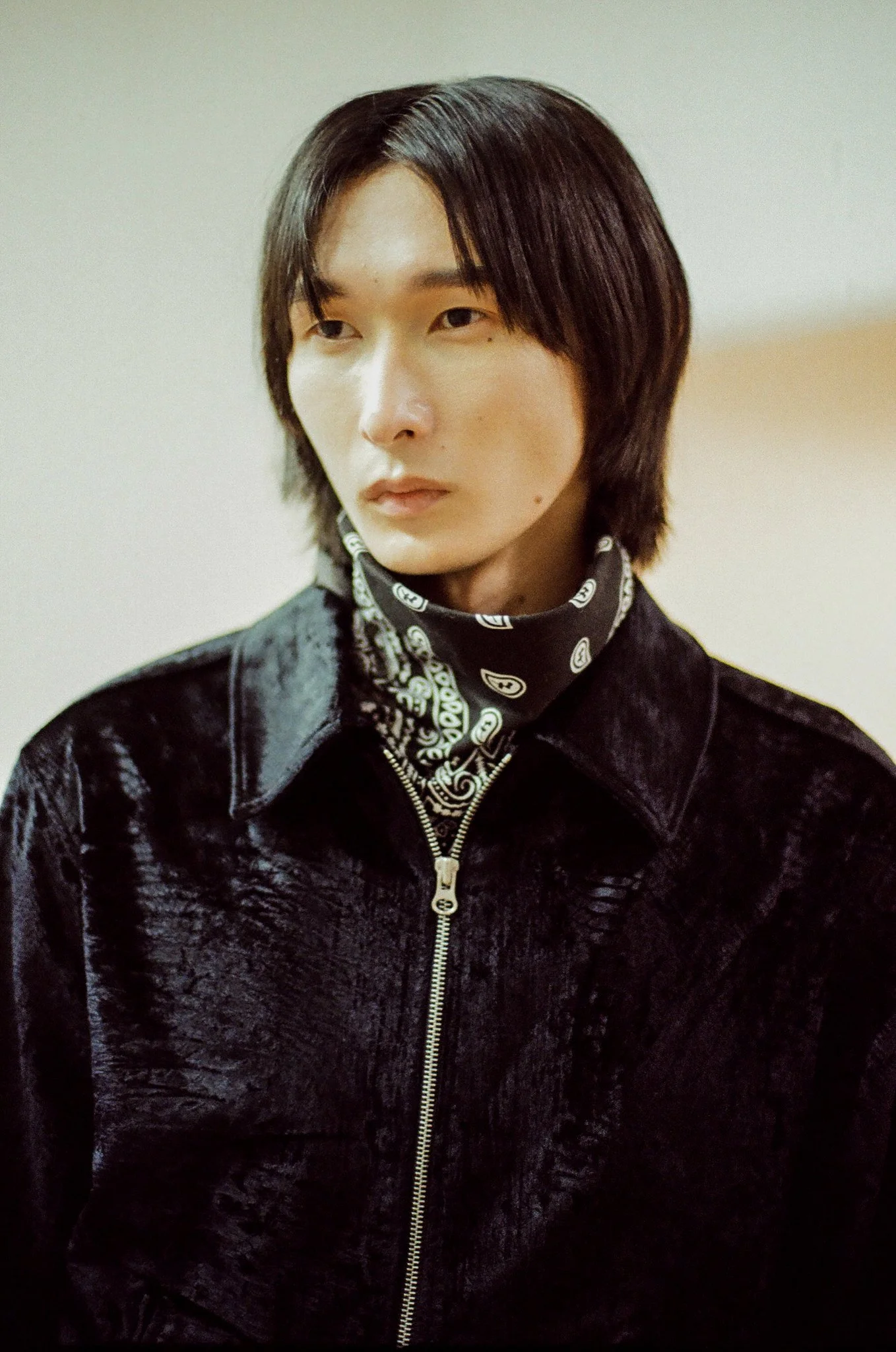 35mm portrait of a Korean male model wearing a bandana