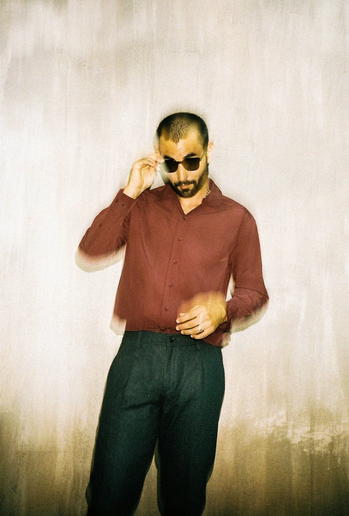 35mm film photograph of a man wearing sunglasses