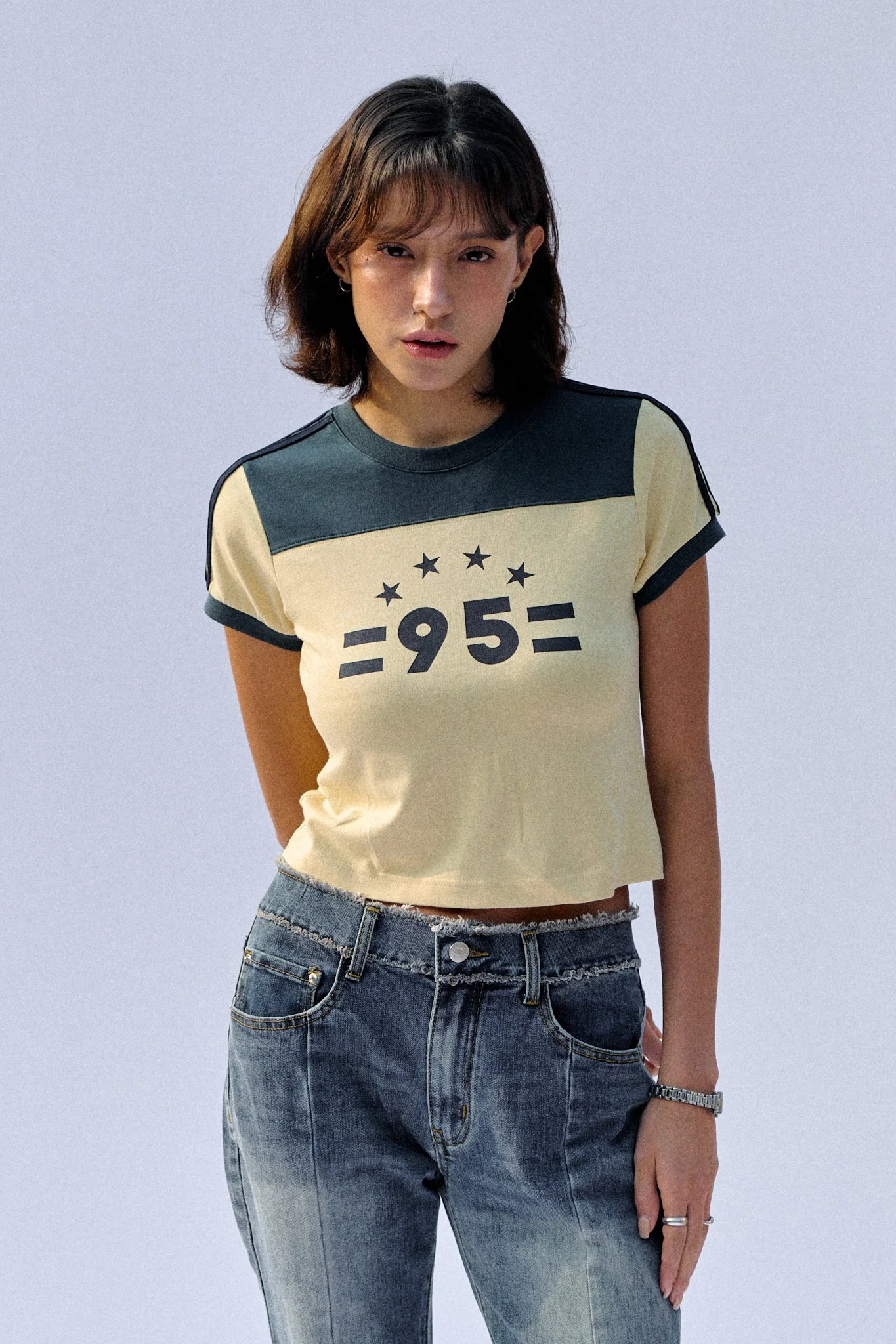 Studio photograph of a female model in natural light