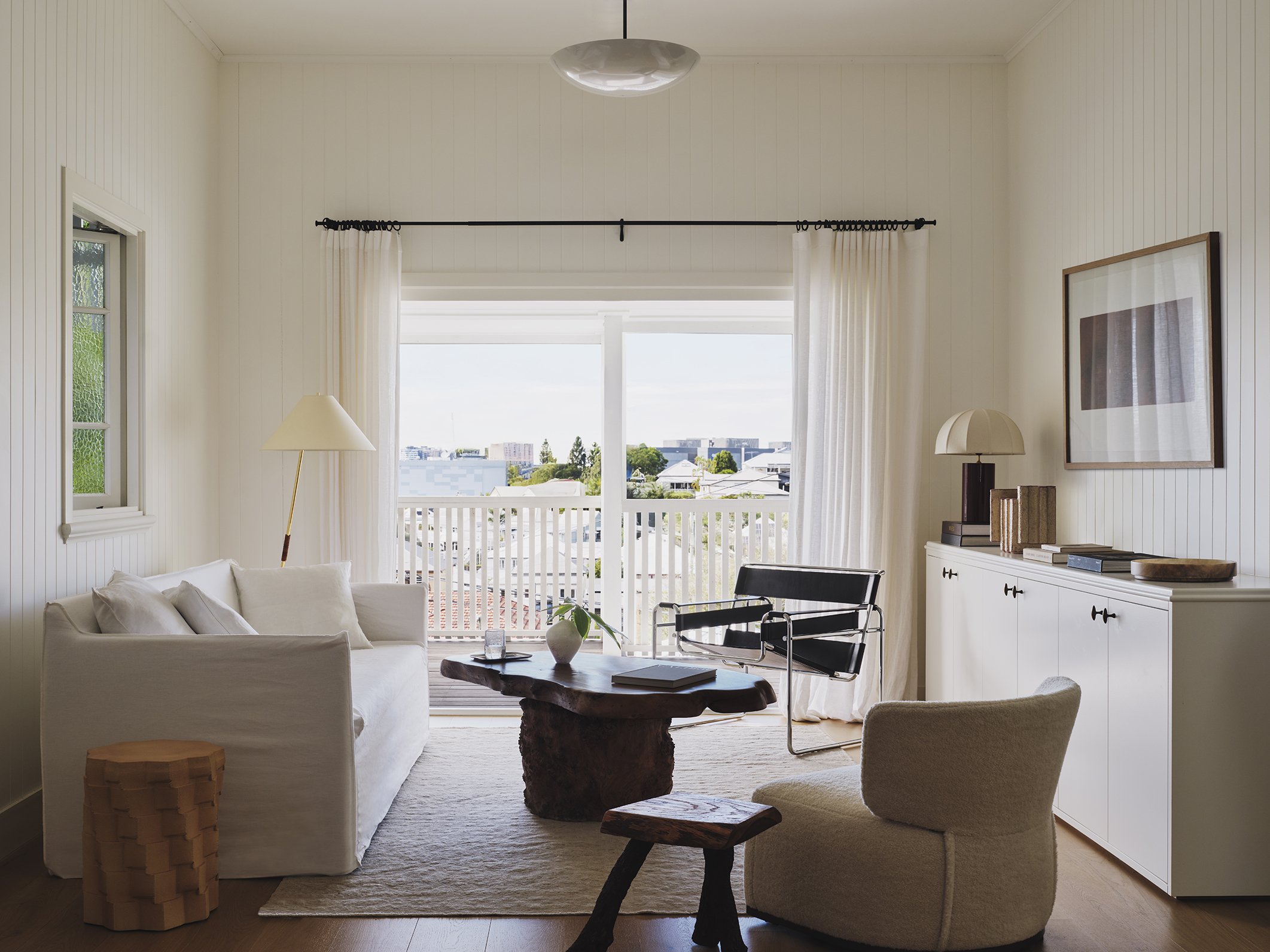 Light-filled living room with heritage detailing and custom joinery