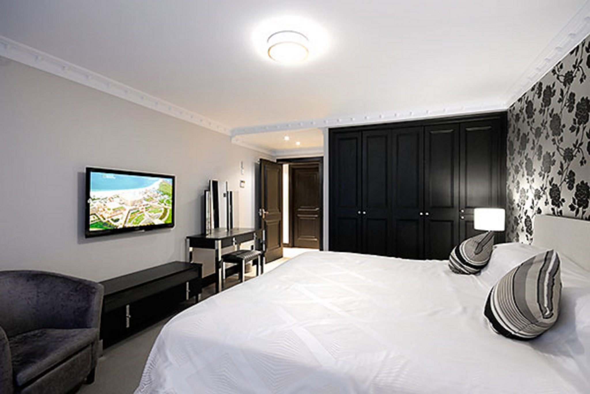 4. Shepherd Street Apartments 3 bedroom tv bed.jpg