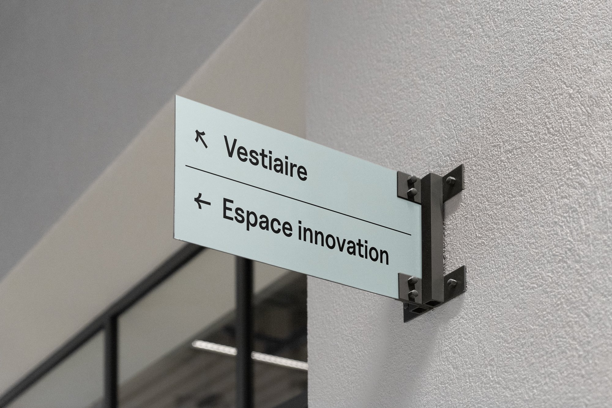 Free-Metal-Sign-on-Wall-Mockup.jpg
