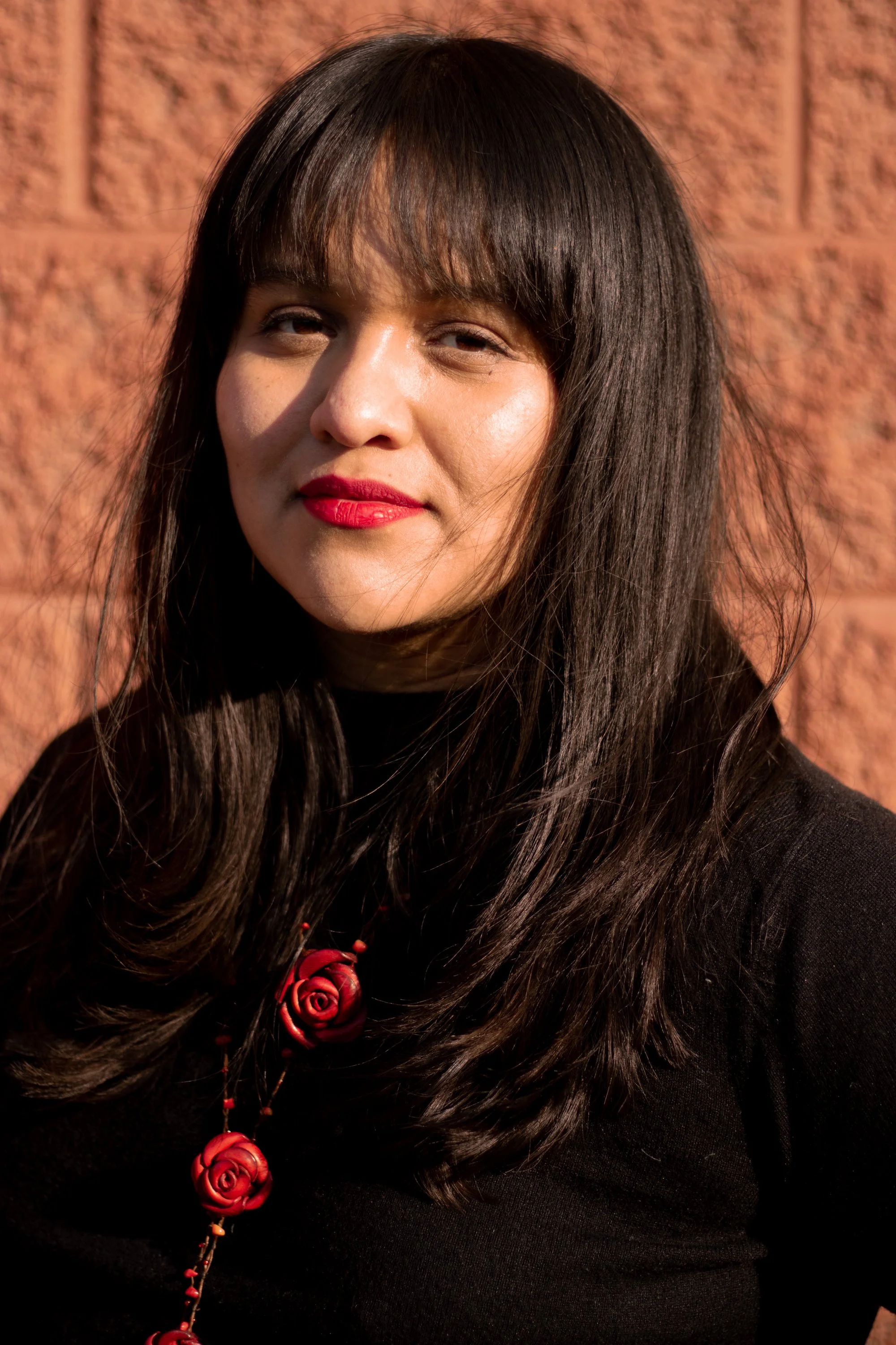 She specializes in community-led initiatives.