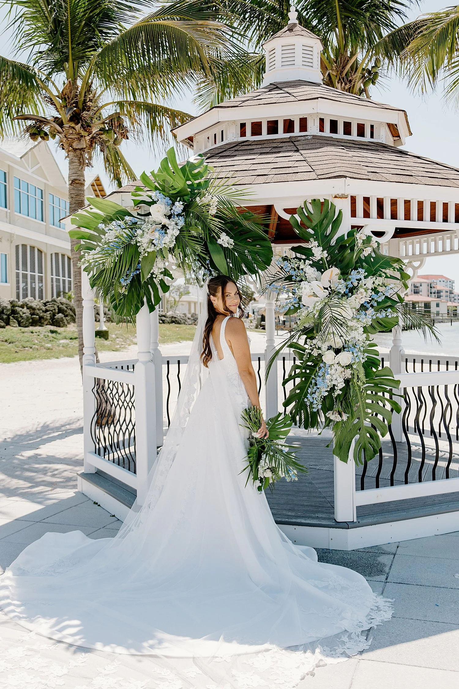 bride stands in front of gazebo at Isla Del Sol Yacht and Country Club