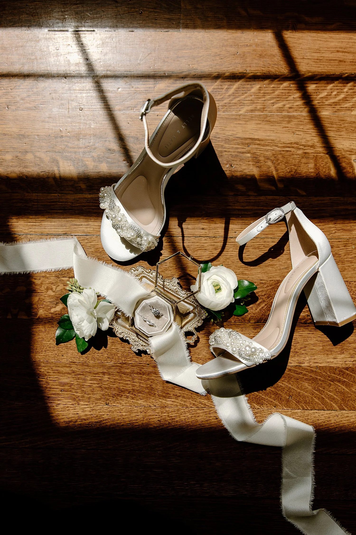  invitation suite laid out in window shadows at Bella Cosa 