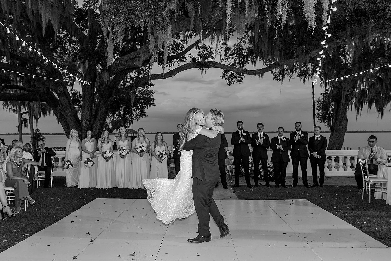  husband spins his new wife on the dance floor at Bella Cosa 