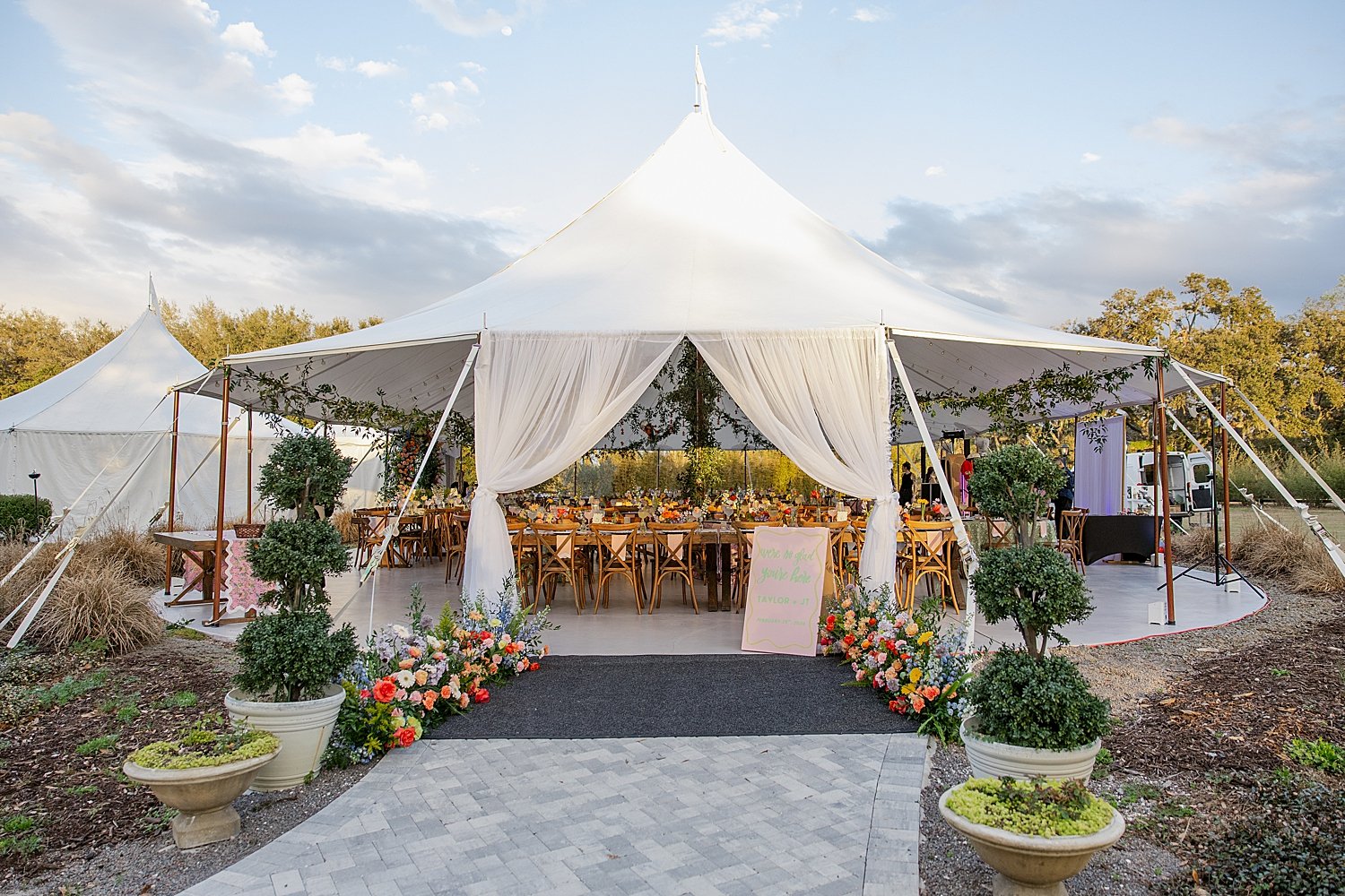  large white tent on garden lawn at venue by Taylor Shea Photo 