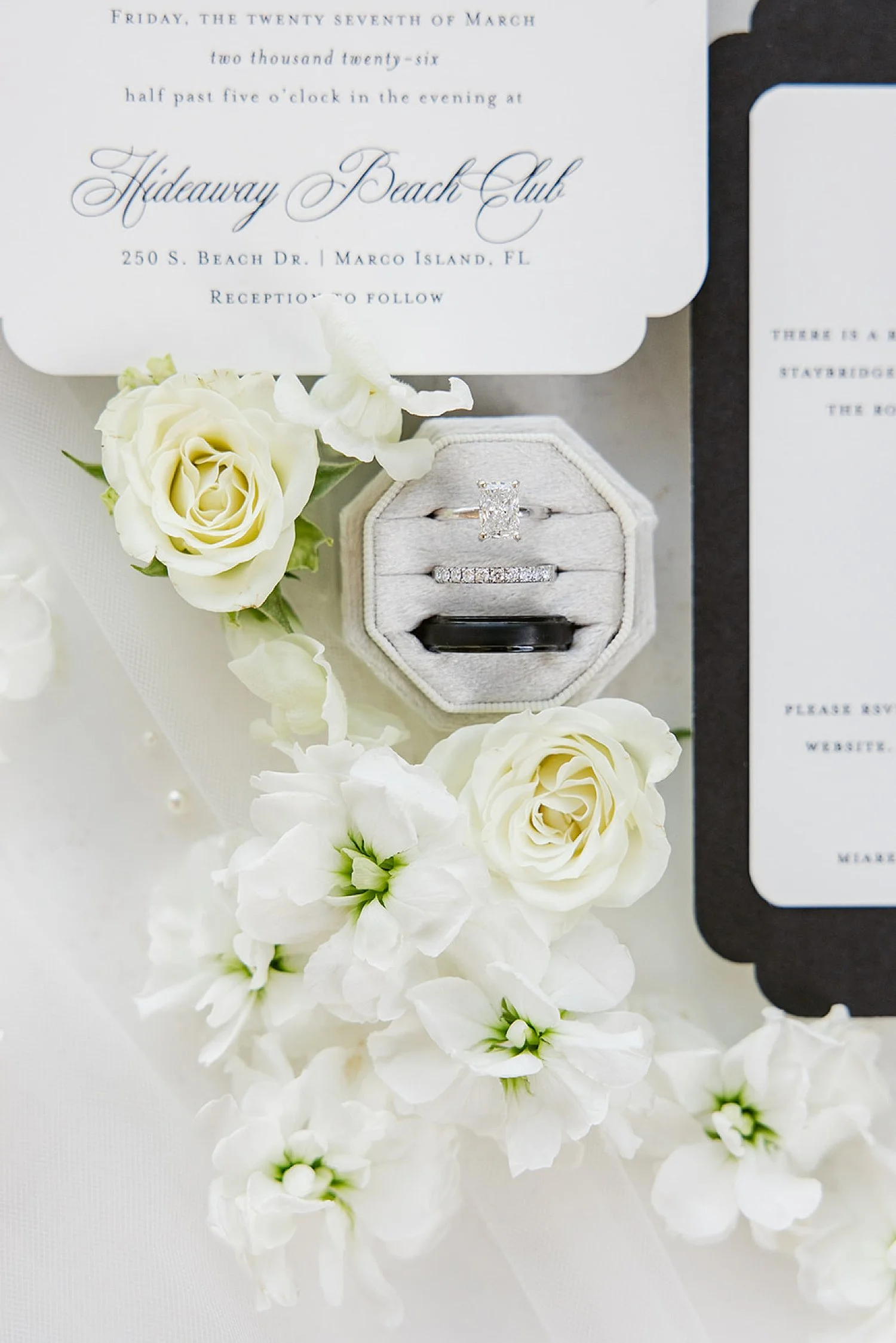  florals and rings in getting ready space by Florida wedding photographer 