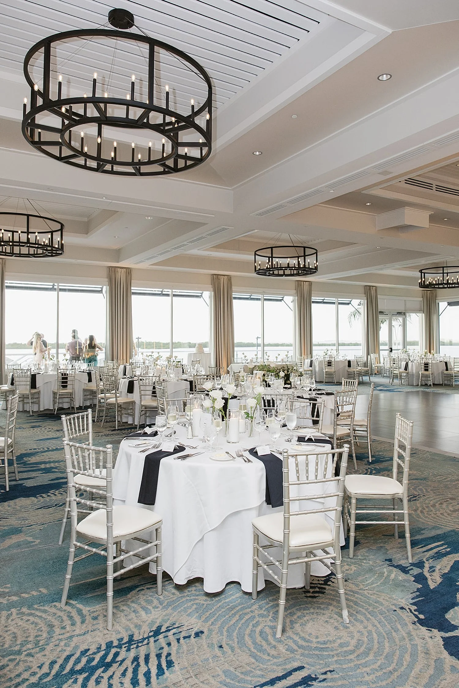  large reception space set up in ballroom by Florida wedding photographer 