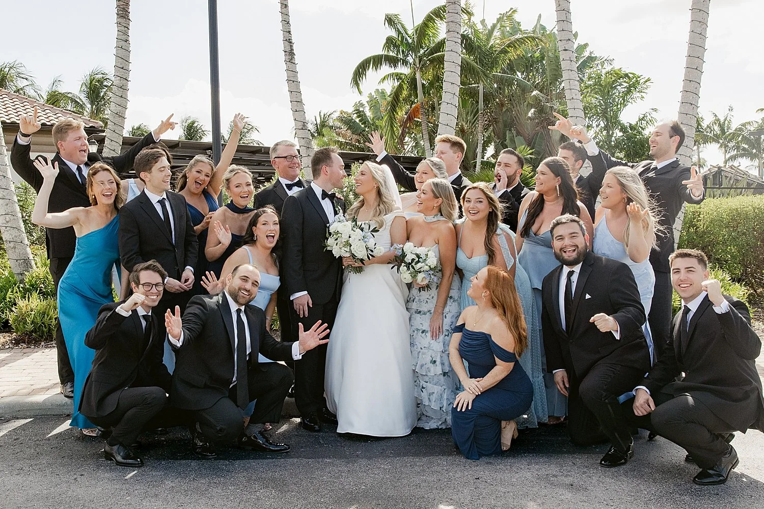  wedding party surrounds bride and groom by Taylor Shea Photography 