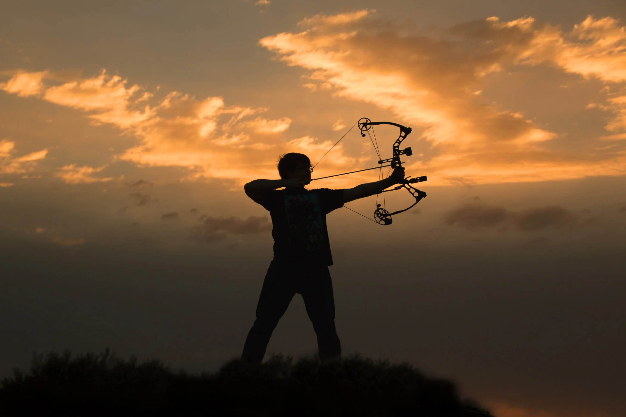Connor is an archer and we thought a silhouette against the sunset really captured the spirit