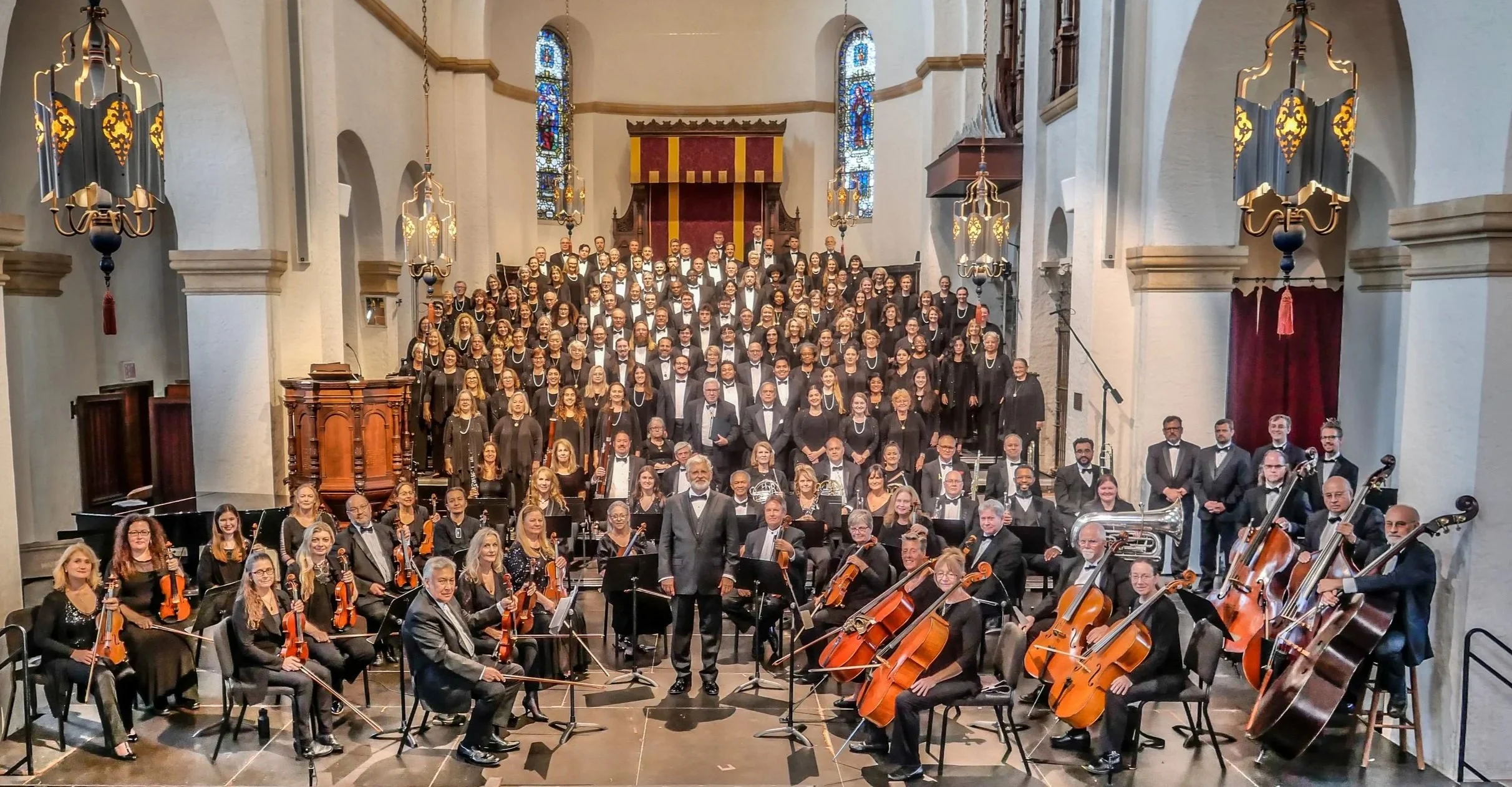 Dr. John V. Sinclair conducting the full 200-member Bach Festival Society Choir and Orchestra on stage in Winter Park.