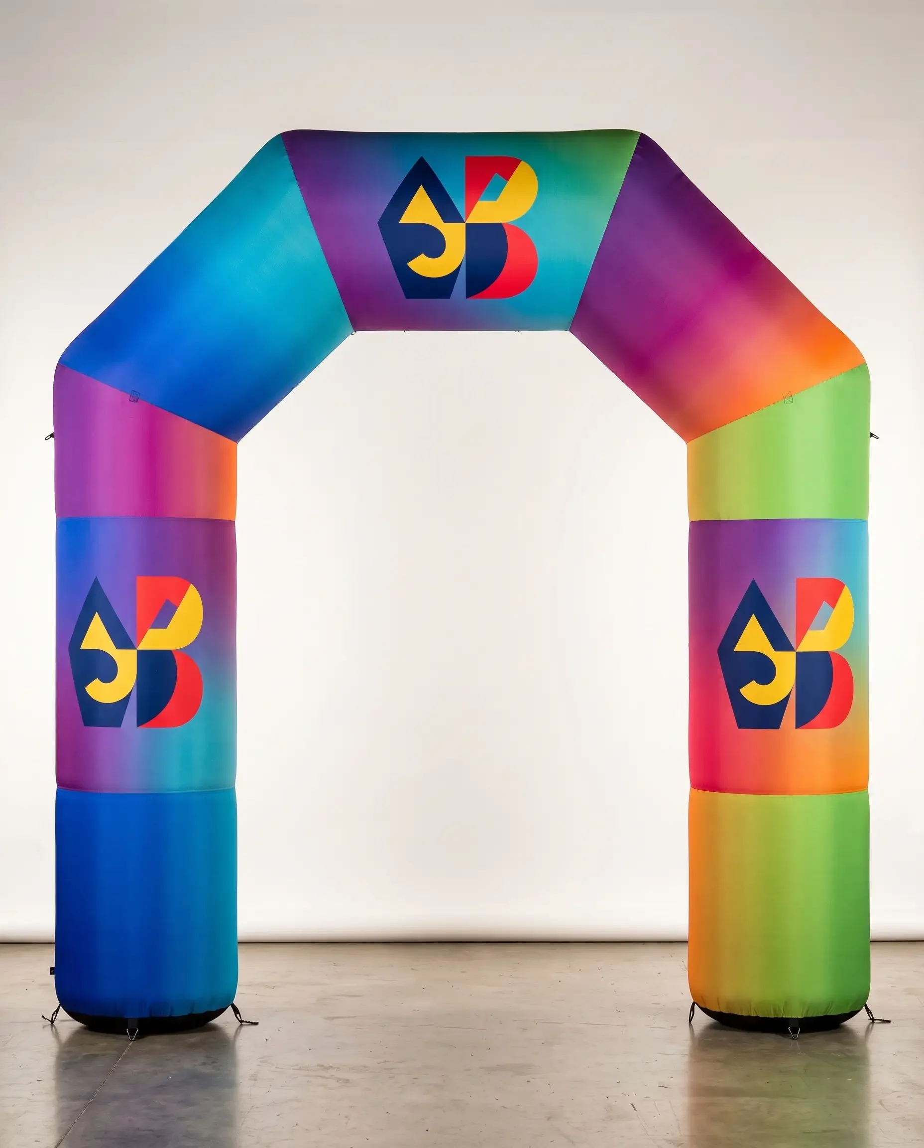 A multi-panel custom-printed inflatable arch showing gradient branding and a logo.