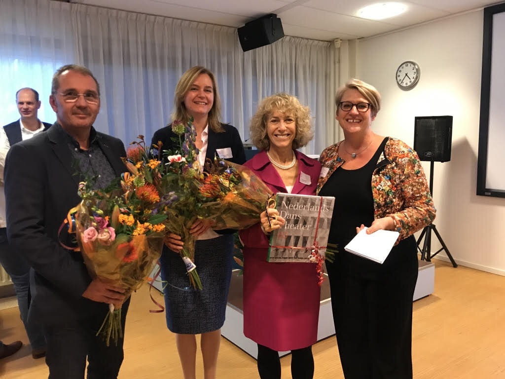  Flowers (after all it’s Amsterdam) and a book after my plenary on Moral Trauma: from Dilemma to Psychotrauma. (L-R: Aart van Oosten, (fire chief, Arnemuide, Netherlands) Jackie June ter Heide (Clinical psychologist, senior researcher at Centrum '45 