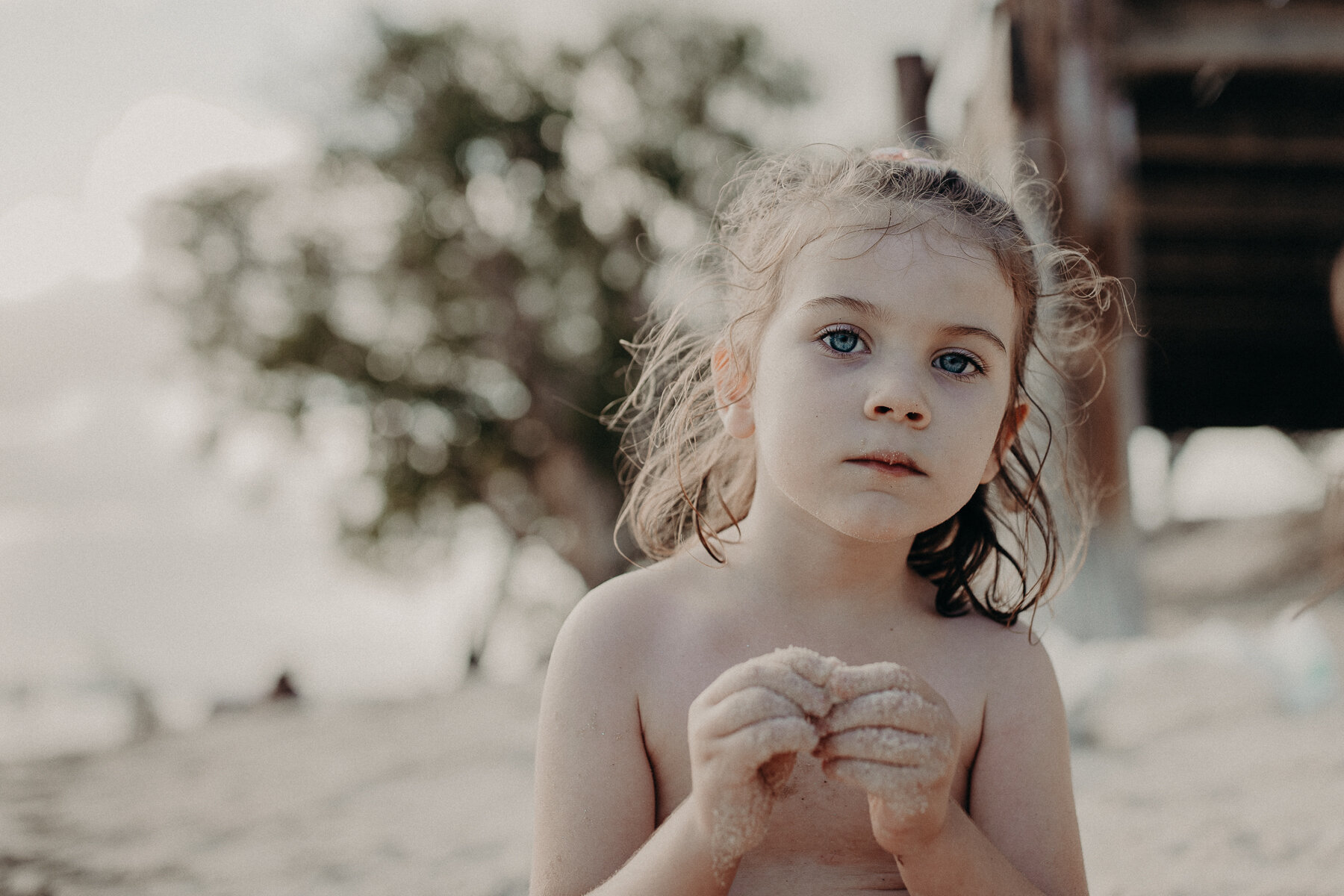 Girl playing Sylvan Beach Bribie Island