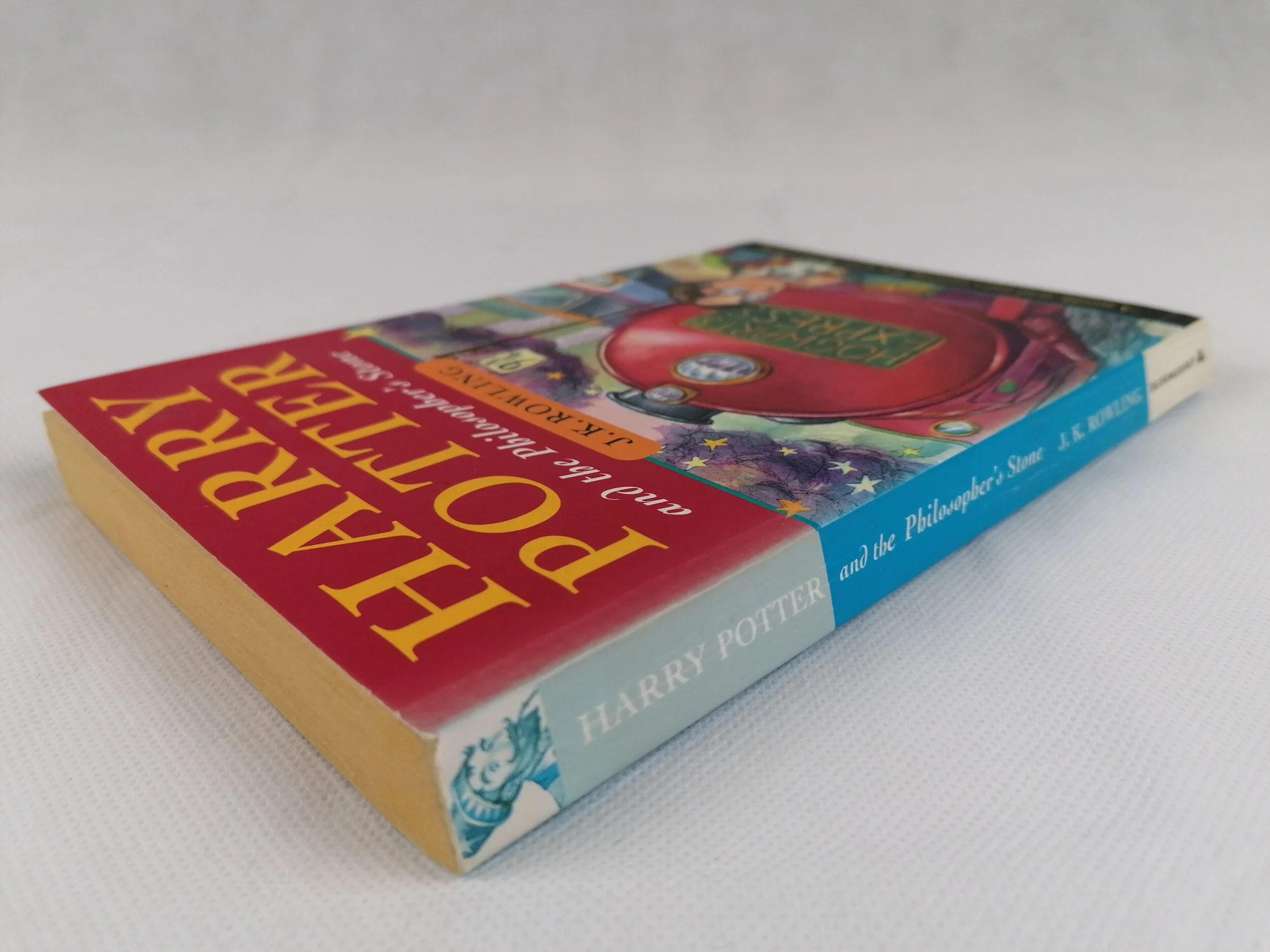 Harry Potter &amp; The Philosopher's Stone JK Rowling 1st first edition 5th Printing 1997 paperback wendy cooling iconic antiques 9