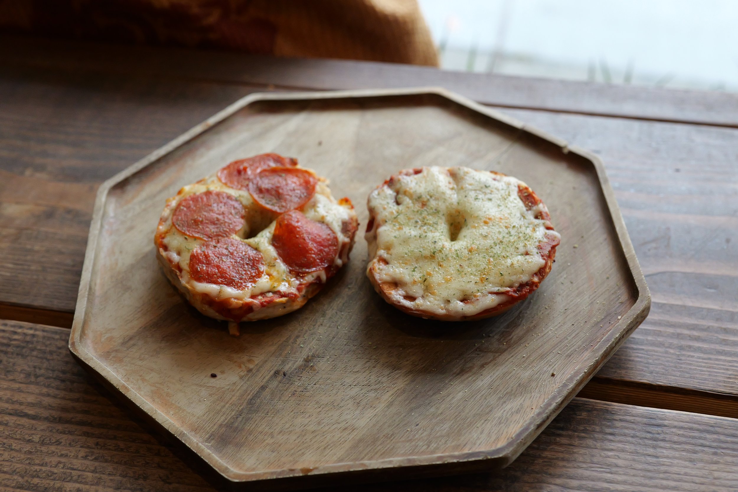 Two variations of our pizza bagels