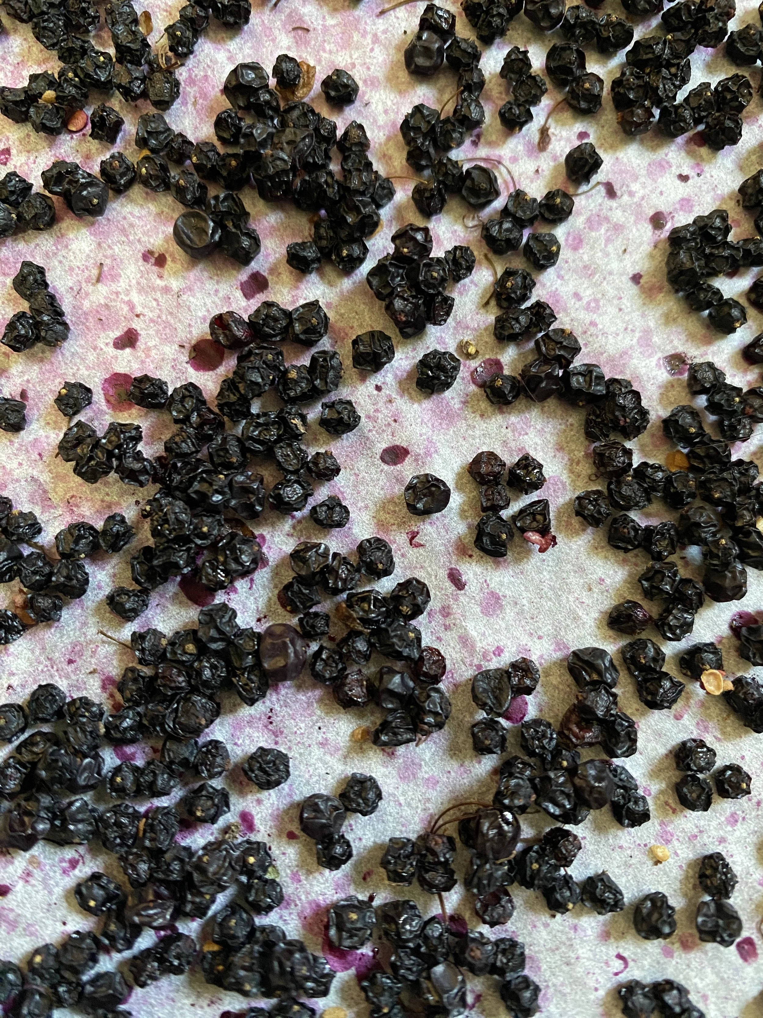 Dried elderberries for homemade granola. Dried elderberries in the oven. How to dry elderberries in the oven.