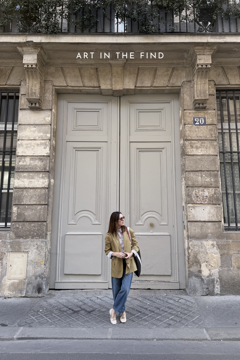 women in front of a building in Paris France