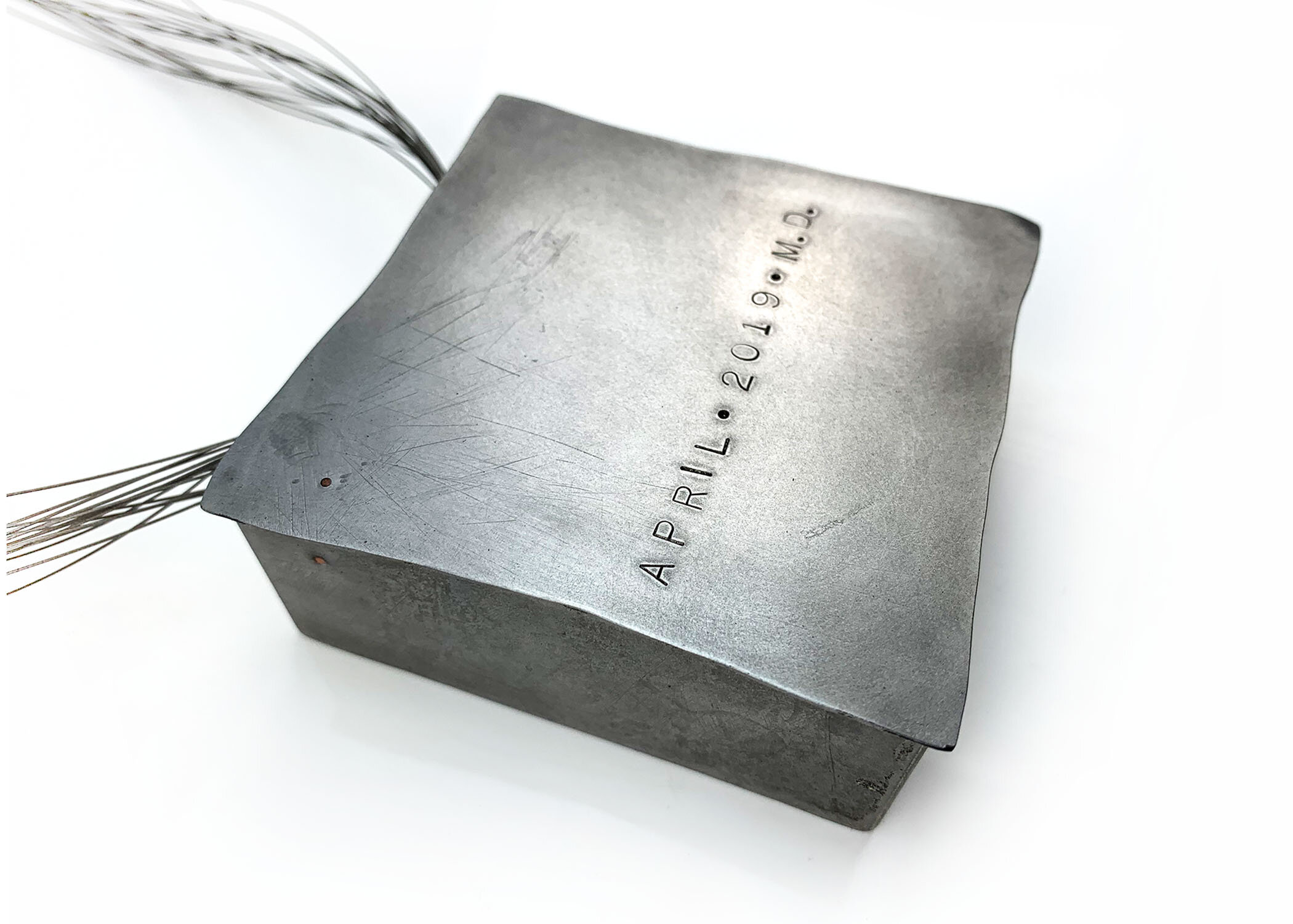 Box, containing a month of marking, steel, 4"x4"