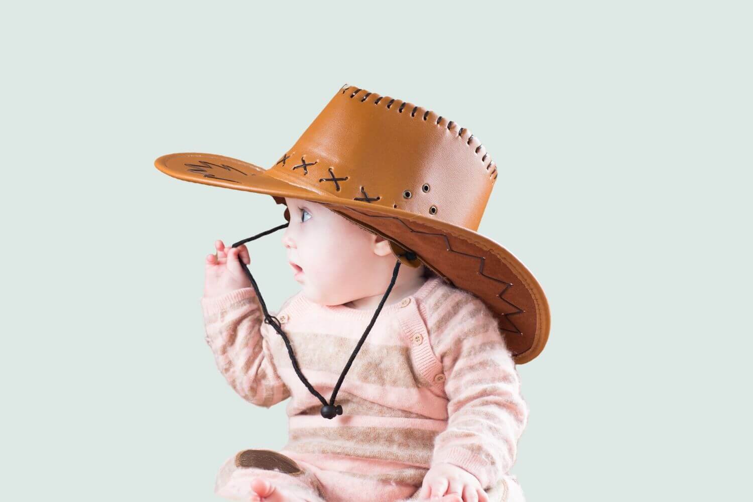 country baby girl wearing western hat
