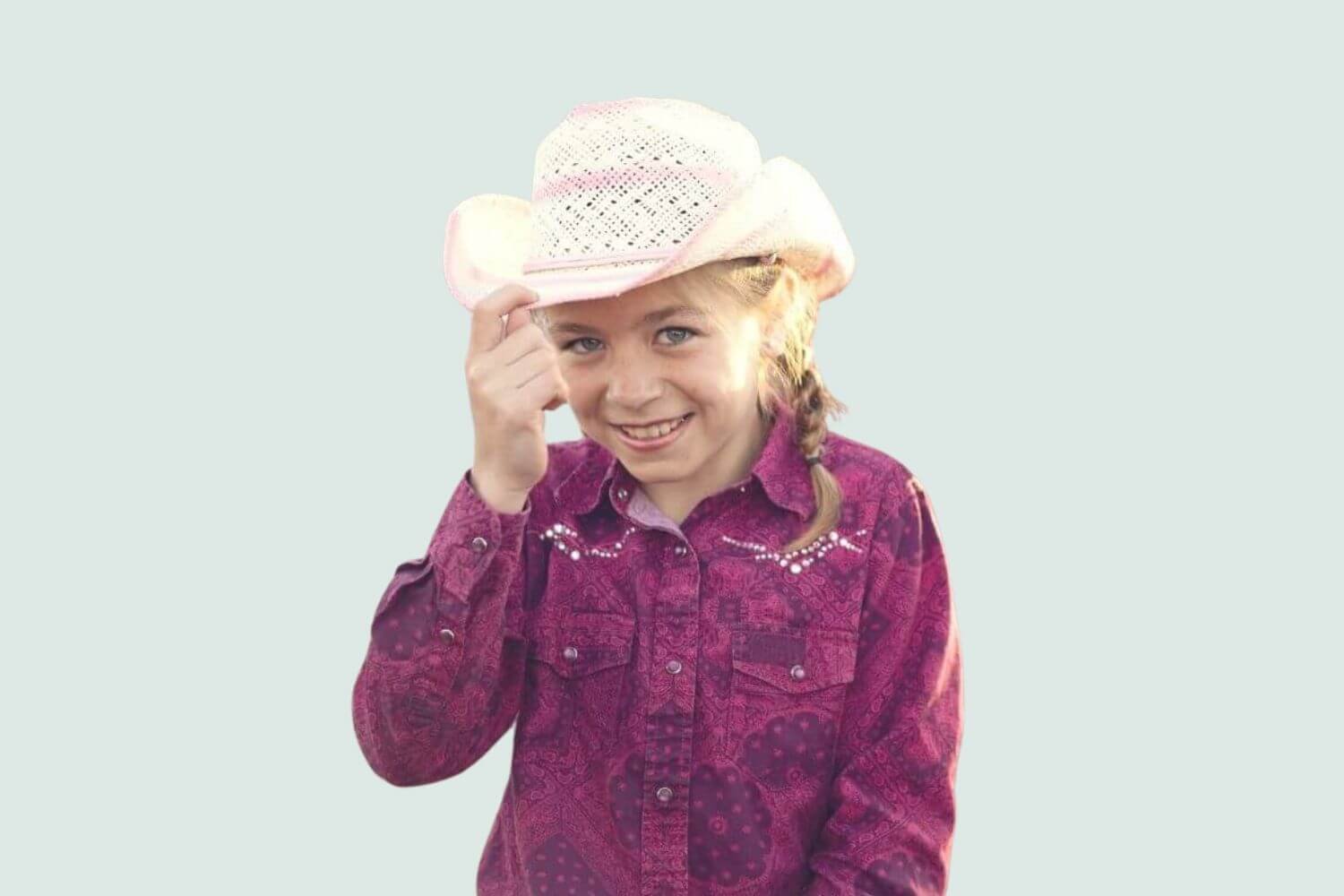 southern girl wearing pink country western clothes and hat