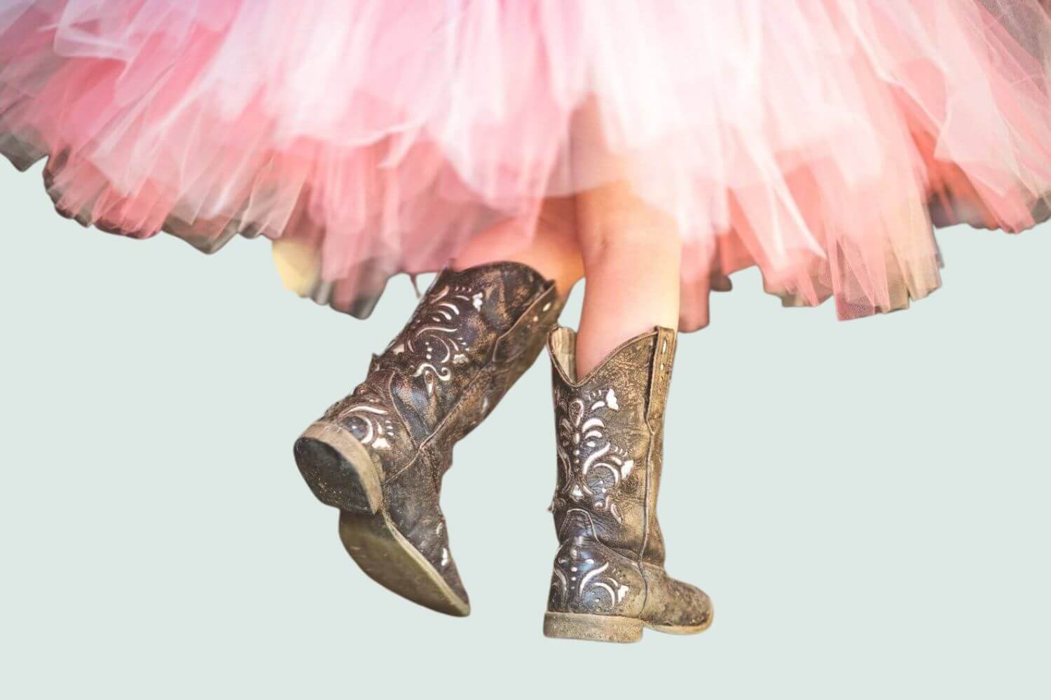 fluffy pink skirt and cowgirl boots