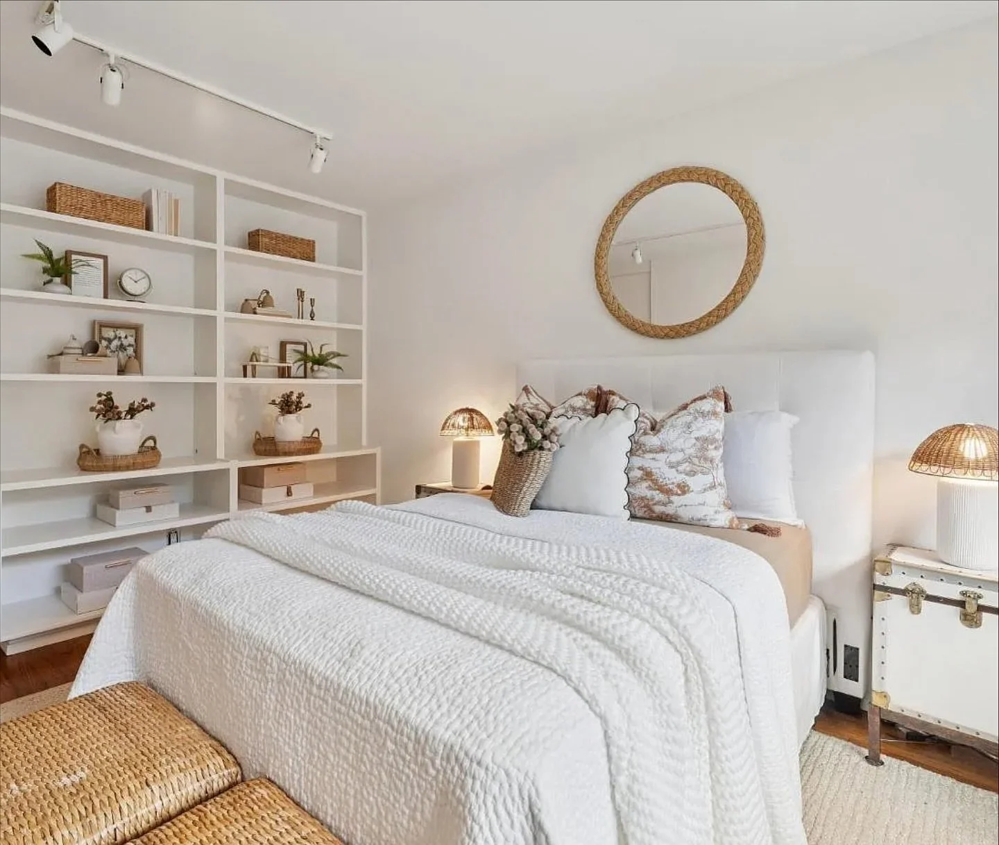 A serene escape in shades of white with just a whisper of pink. ✨

This sweet bedroom layers soft textures, feminine touches, and a beautifully styled bookshelf filled with mementos &mdash; creating a space that feels timeless, personal, and effortle