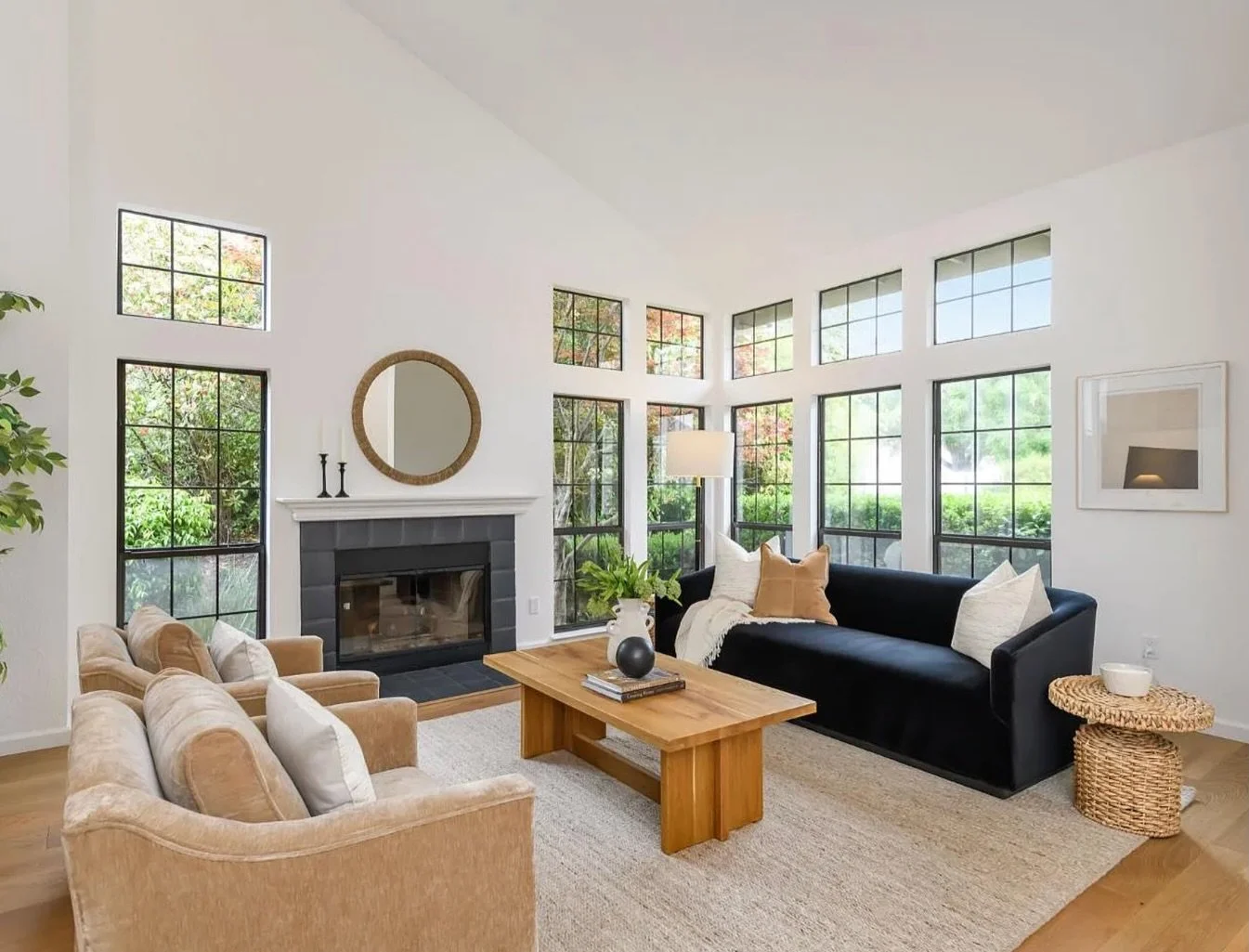 Throughout this home, we carried a cohesive palette of warm neutrals with a black contrast, and natural materials to create a seamless flow from room to room. Each space feels distinct, yet connected &mdash; layered with texture, balanced with light,