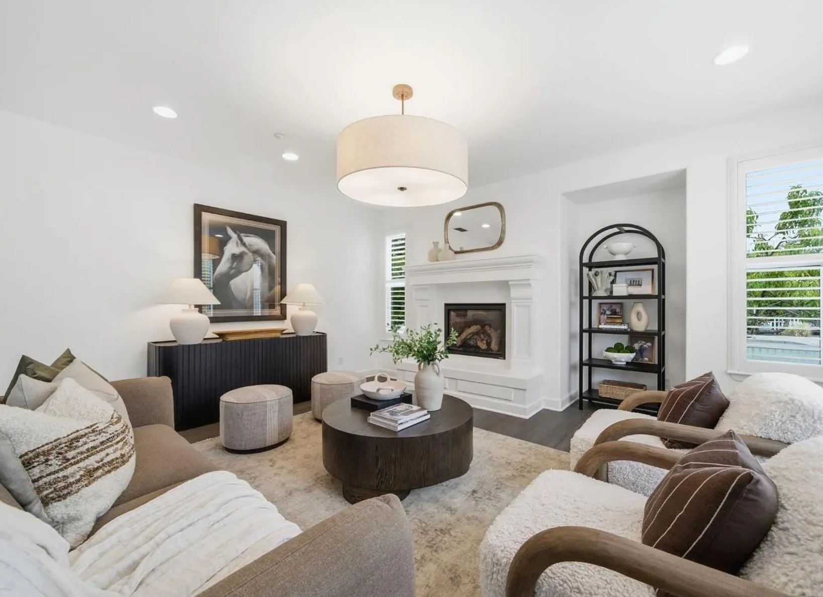 Sonoma living at its finest.

This spacious corner lot property just minutes from the historic Plaza gave us a wonderful canvas to work with. We layered warm taupes, rich chocolate browns, and creamy boucl&eacute; textures throughout &mdash; grounded