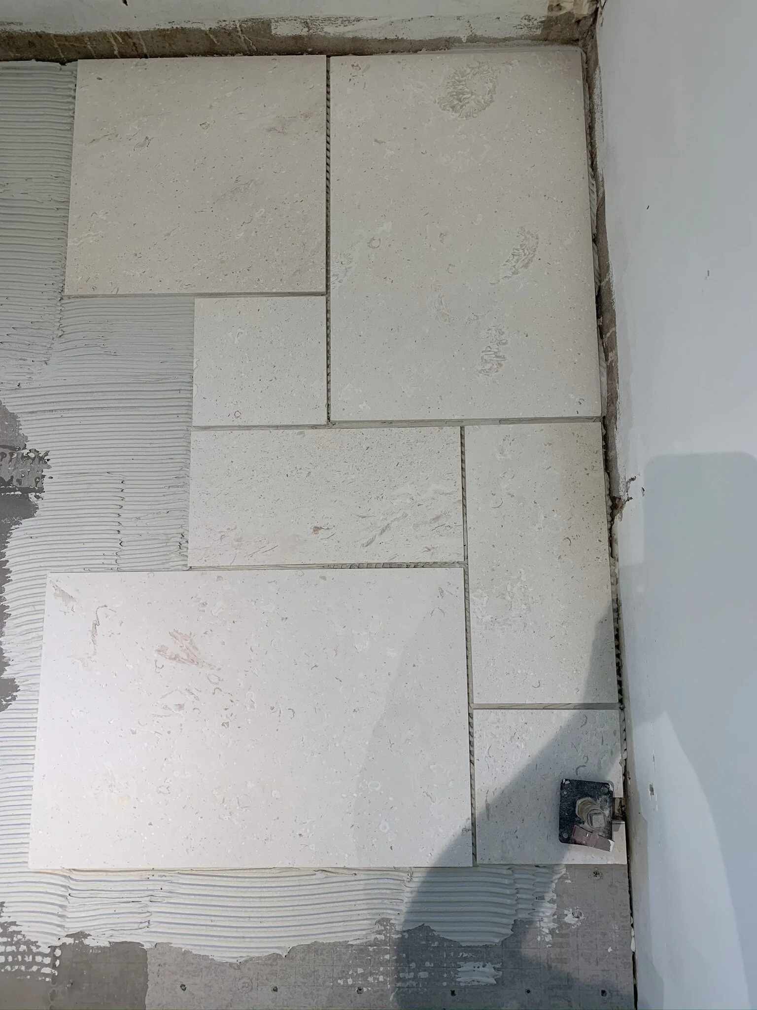 Start of Tile Laying - began in the corner