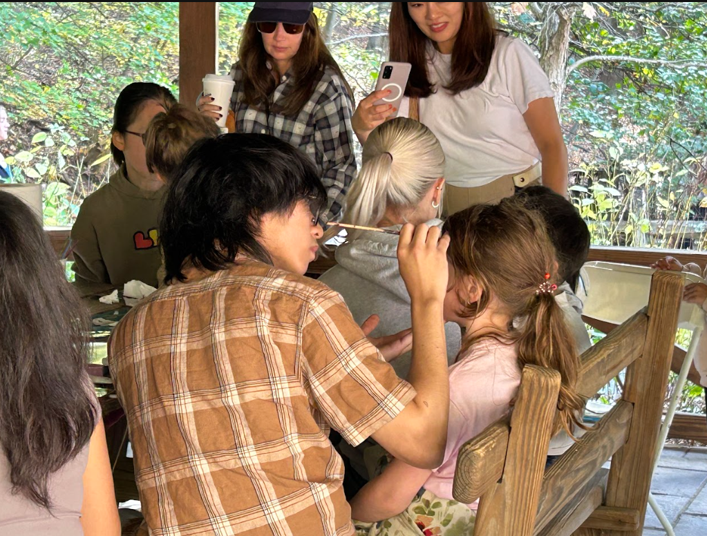 Taking Pictures of Facepainting.png