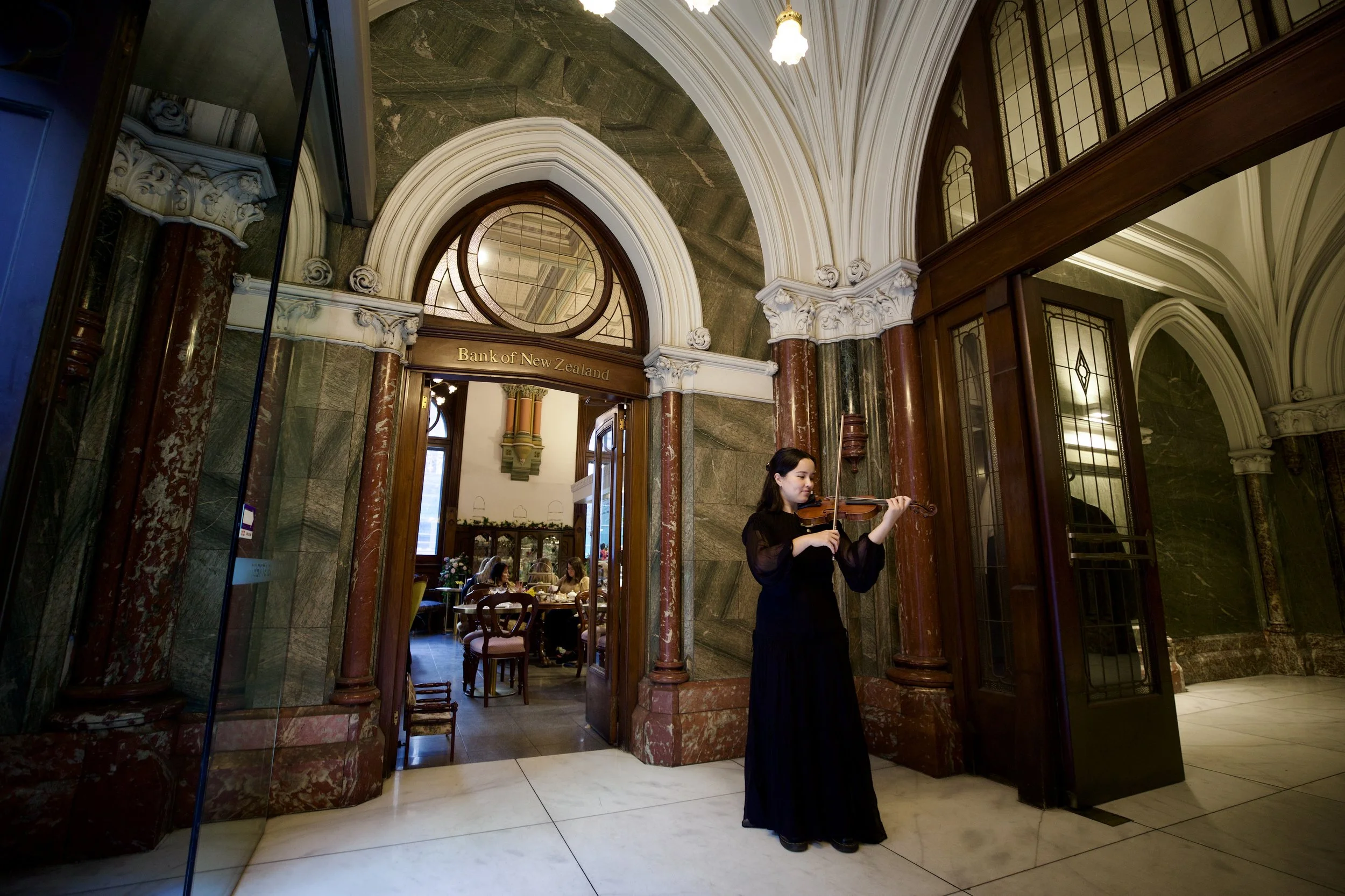 Live violinist on Weekends during Melbourne CBD Best High Tea Experience