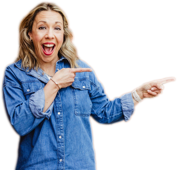 Excited woman with blonde hair wearing a blue denim shirt, smiling and pointing to her right.