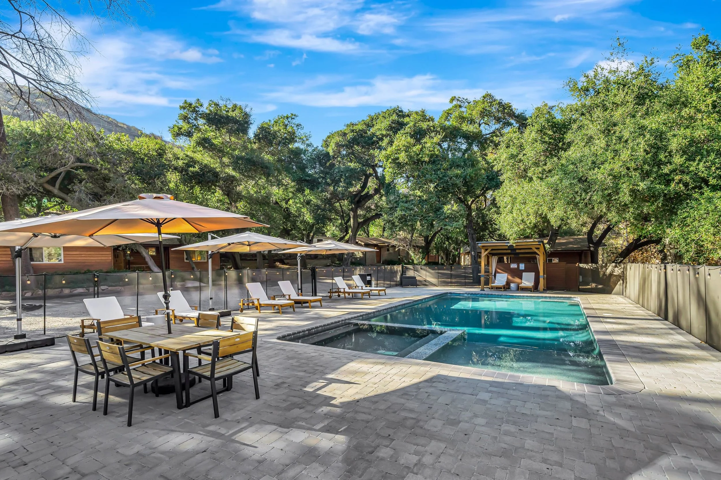 Outdoor lounge spaces with pool Agoura Hills