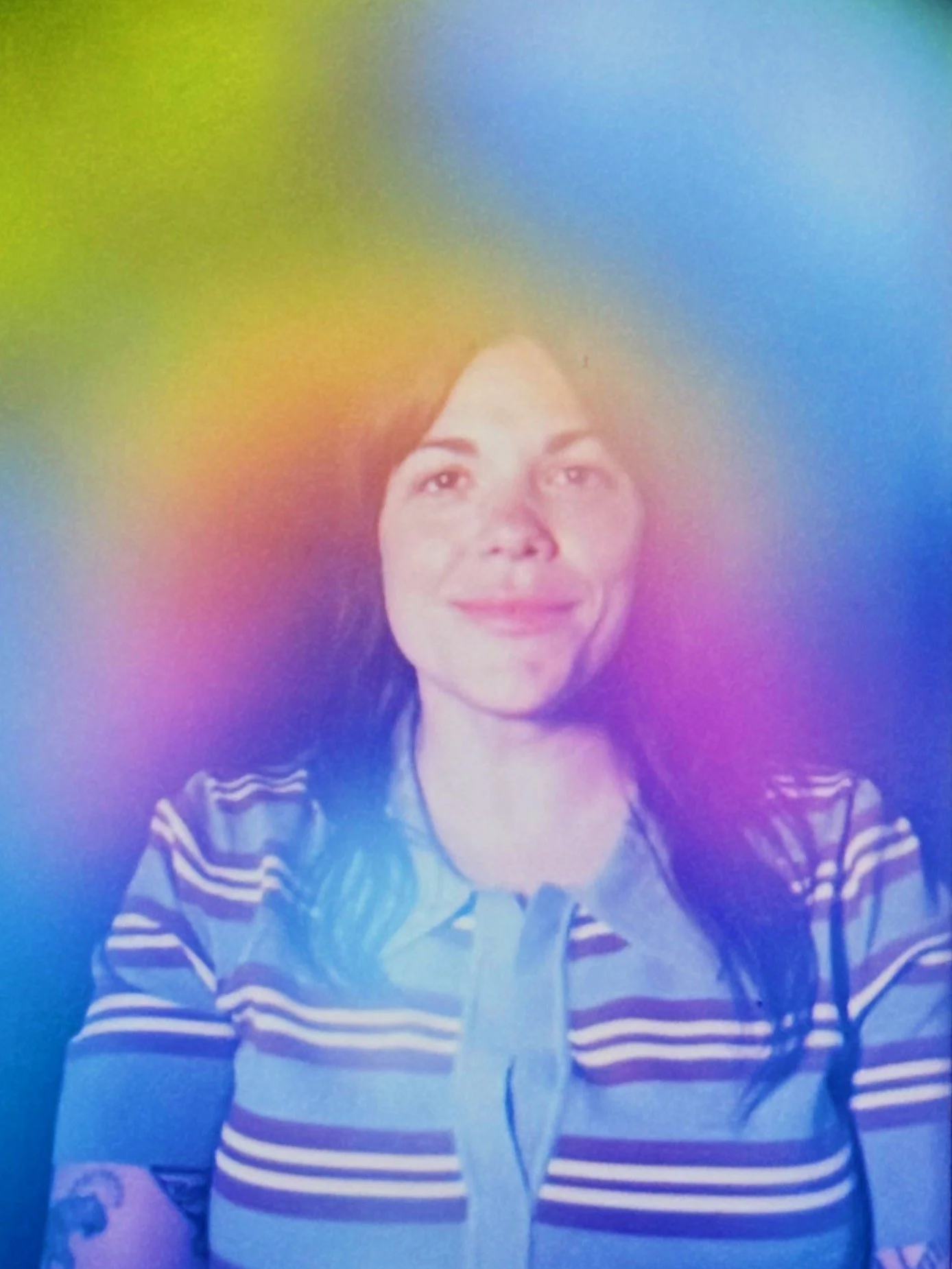 Rainbow aura with blue undertones throughout