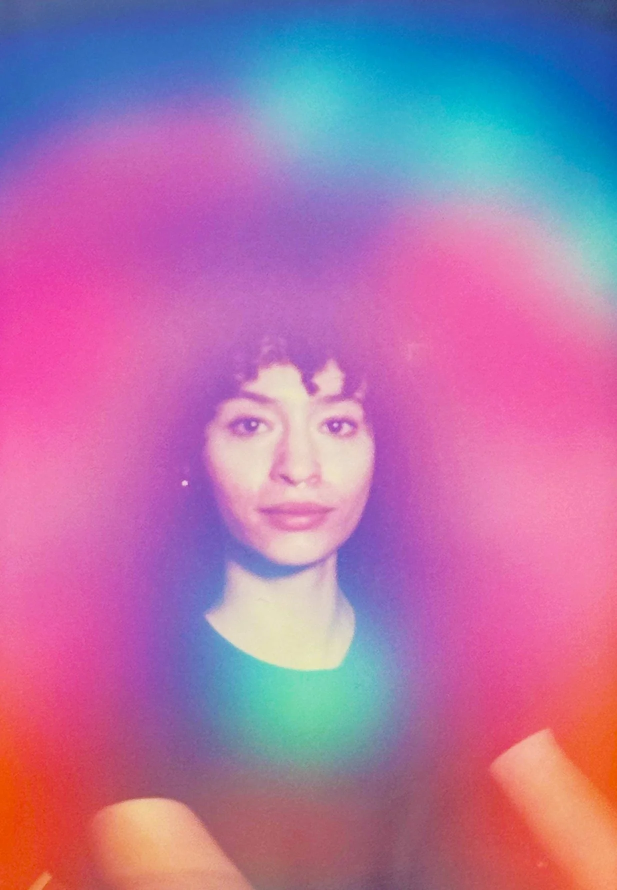 Aura Photograph of a woman with a pink and magenta aura.