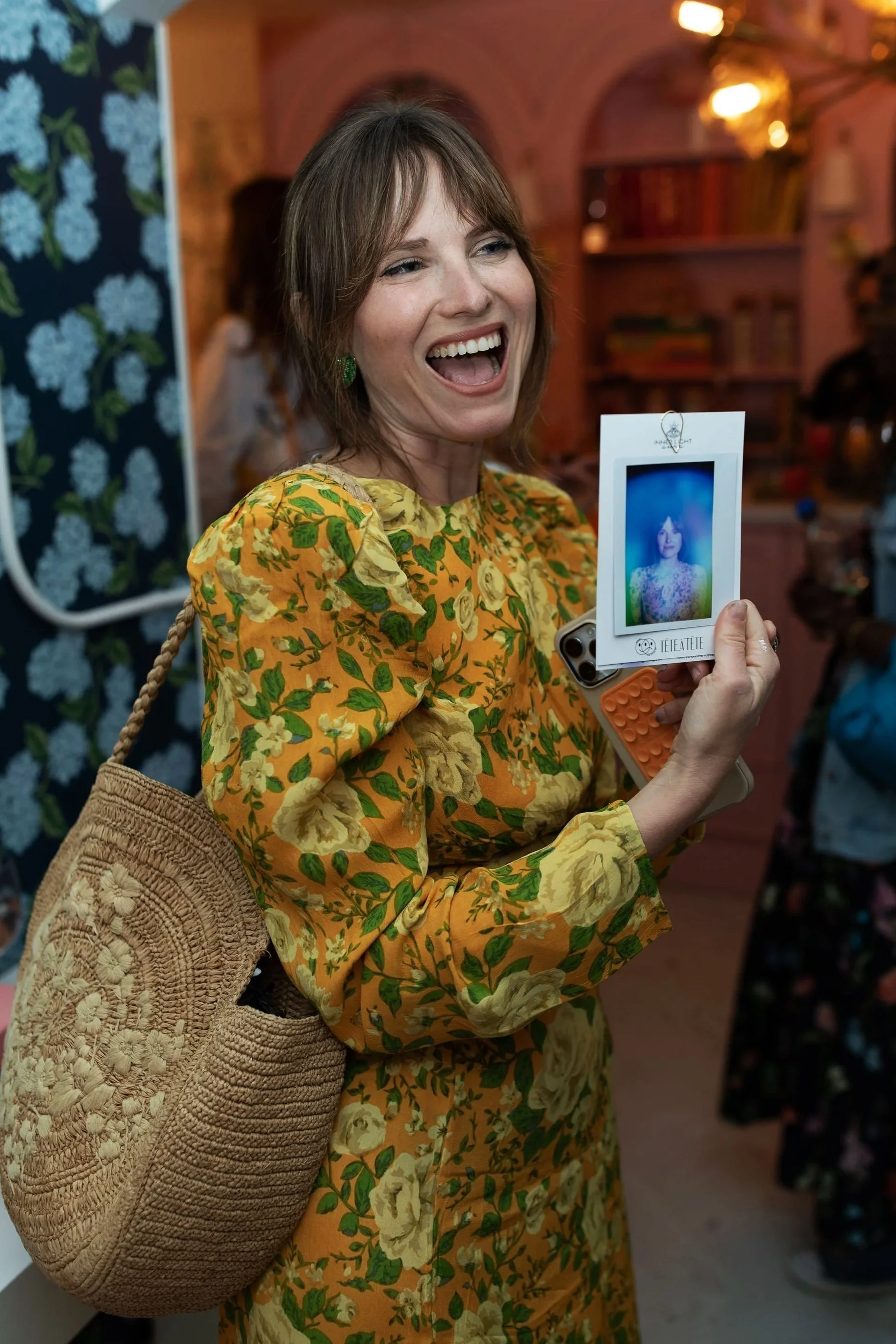 Guest with personalized aura photograph at NYC brand activation by Inner Light Aura