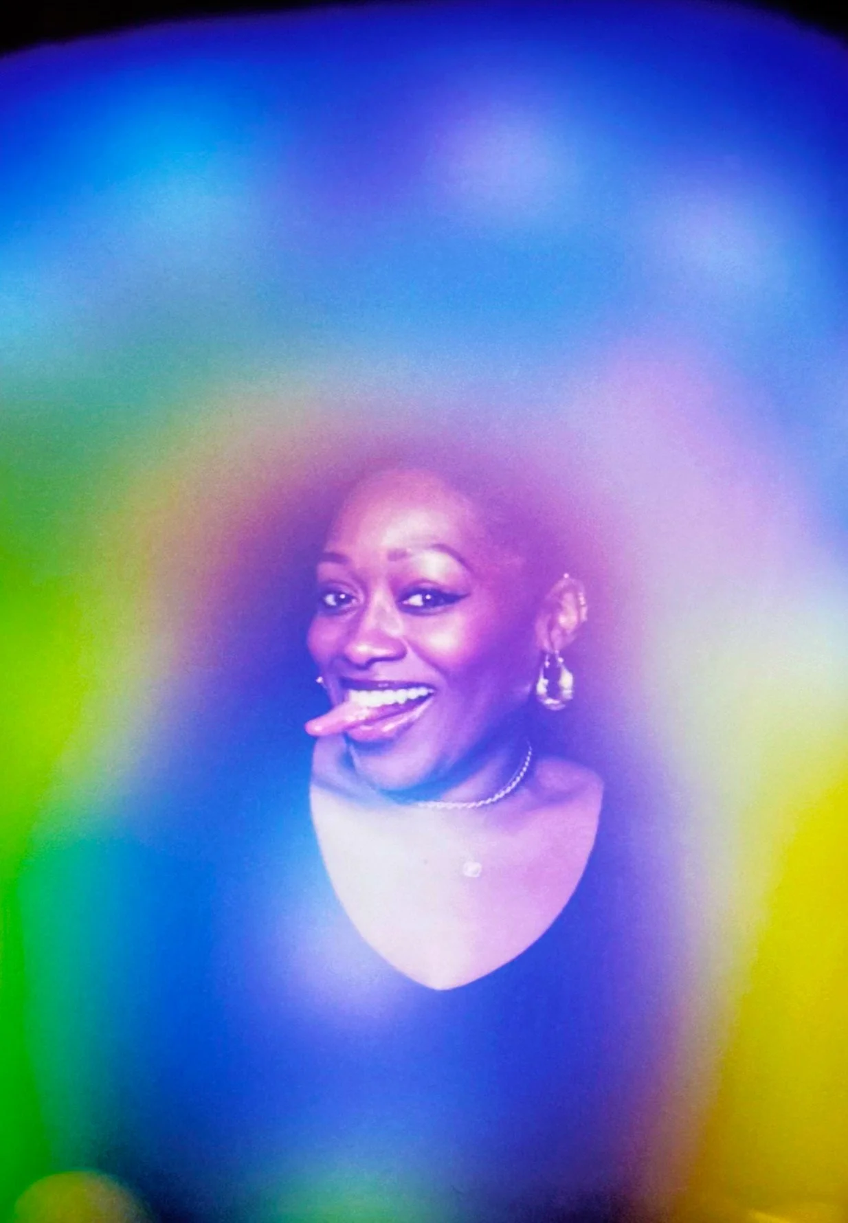 rainbow aura of a woman at a private event in new york city
