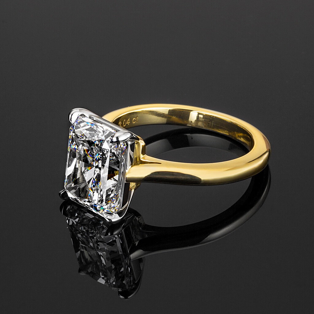 Harmonious two-tone radiant cut solitaire