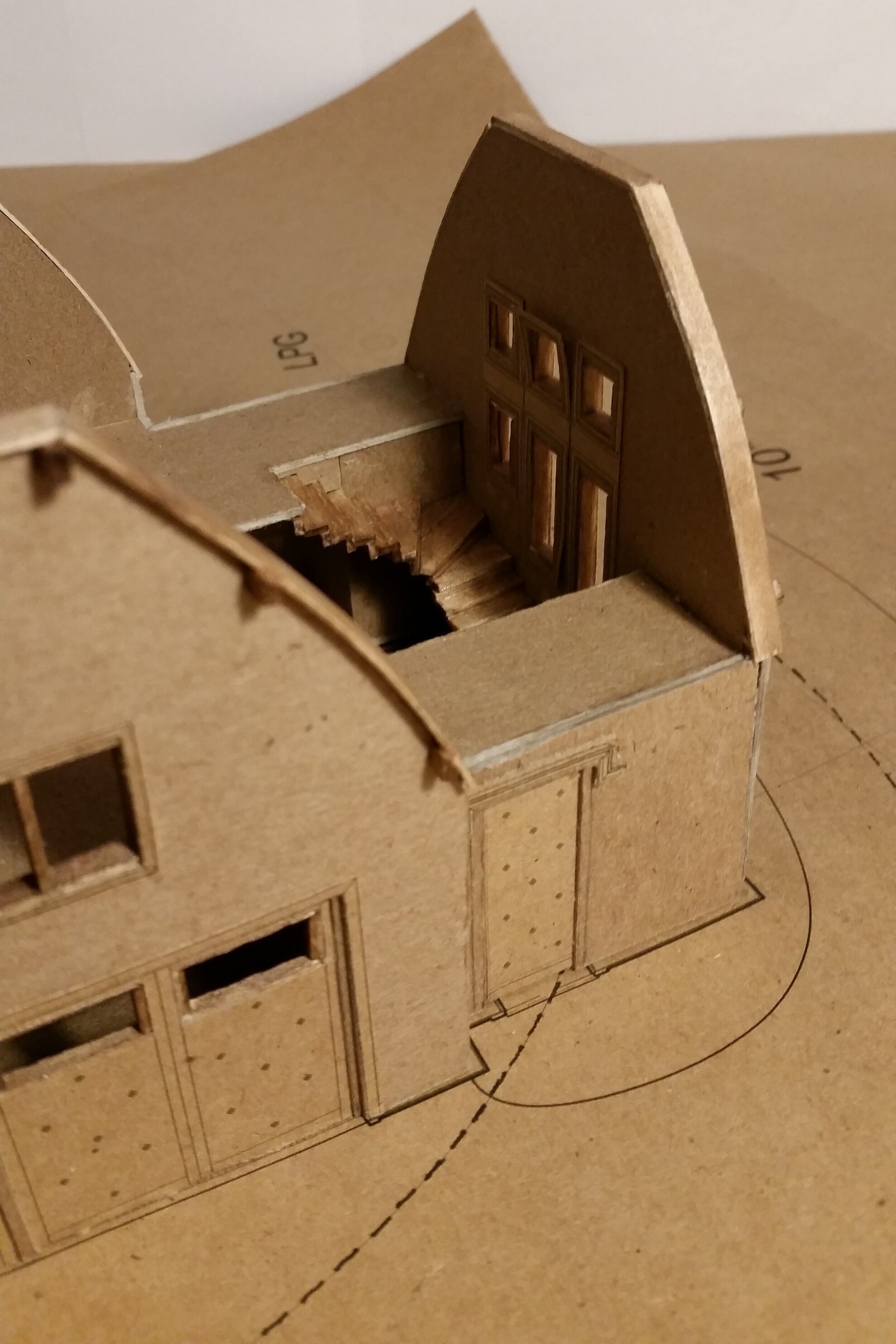 model | view of staircase with roofing removed