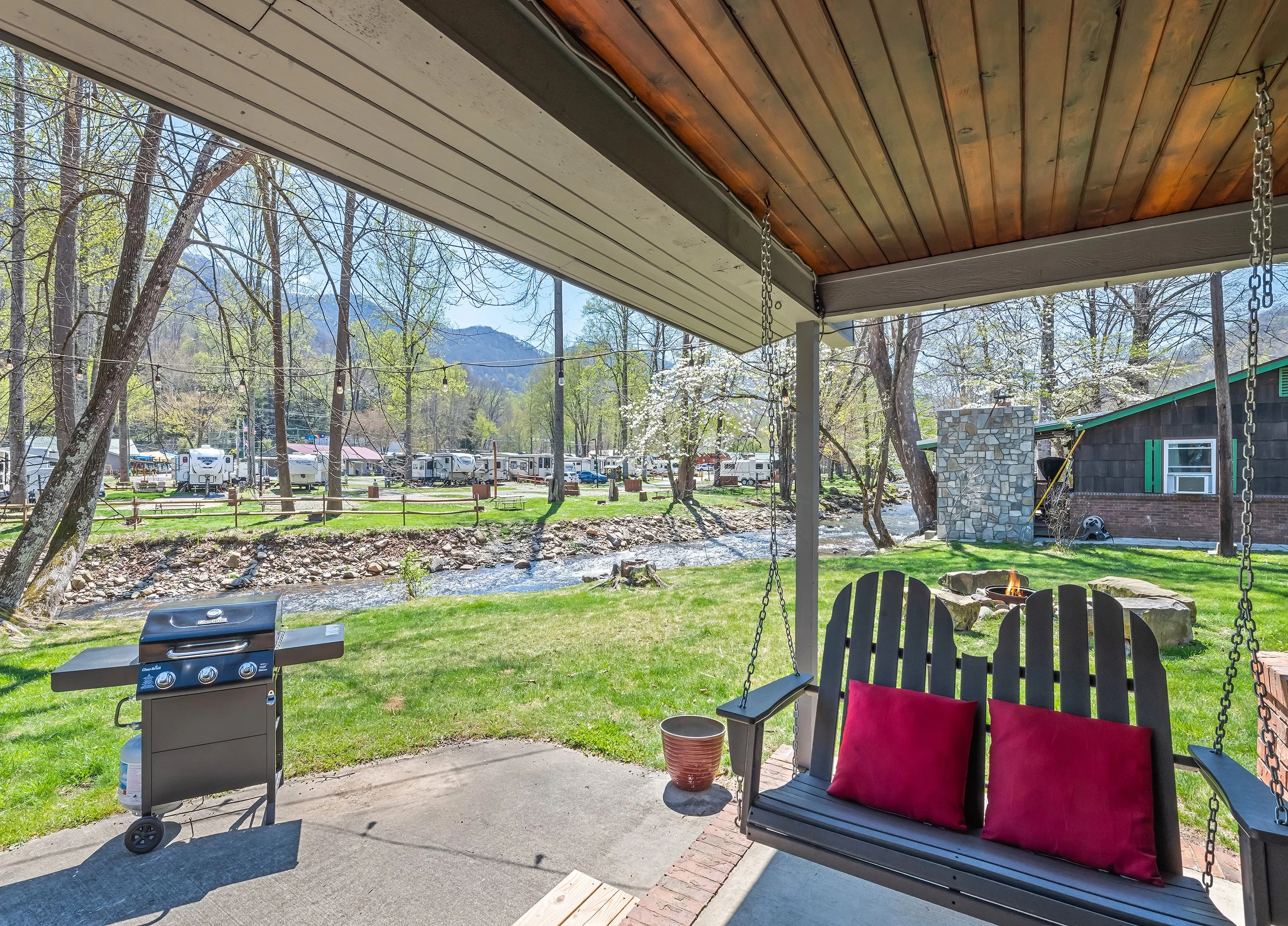 Covered porch area is a great place to enjoy the views and relax.