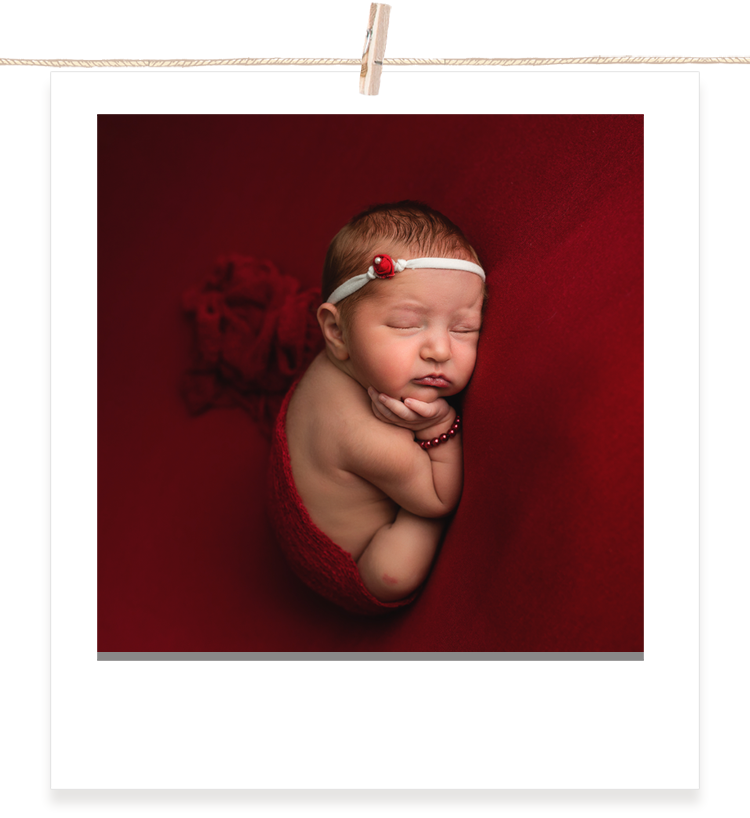 womb pose newborn.png