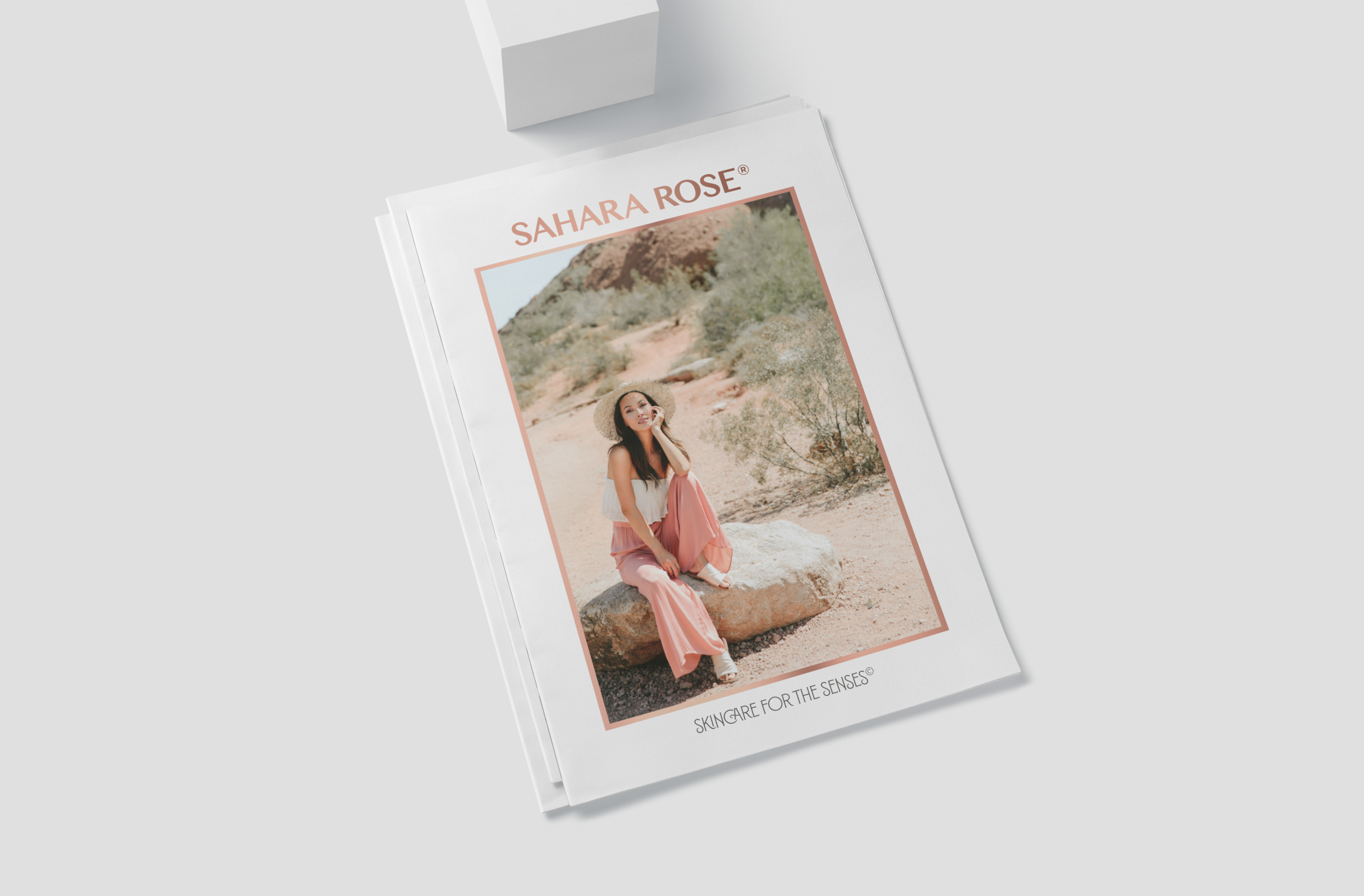 catalog cover of beautiful women in the desert